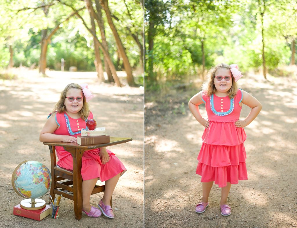 girl in pink dress sits at desk for Back to School Mini Sessions