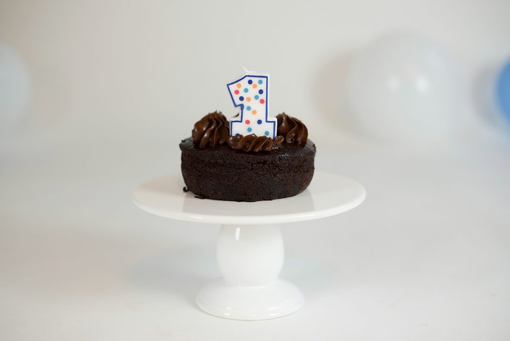 chocolate cake with ONE candle