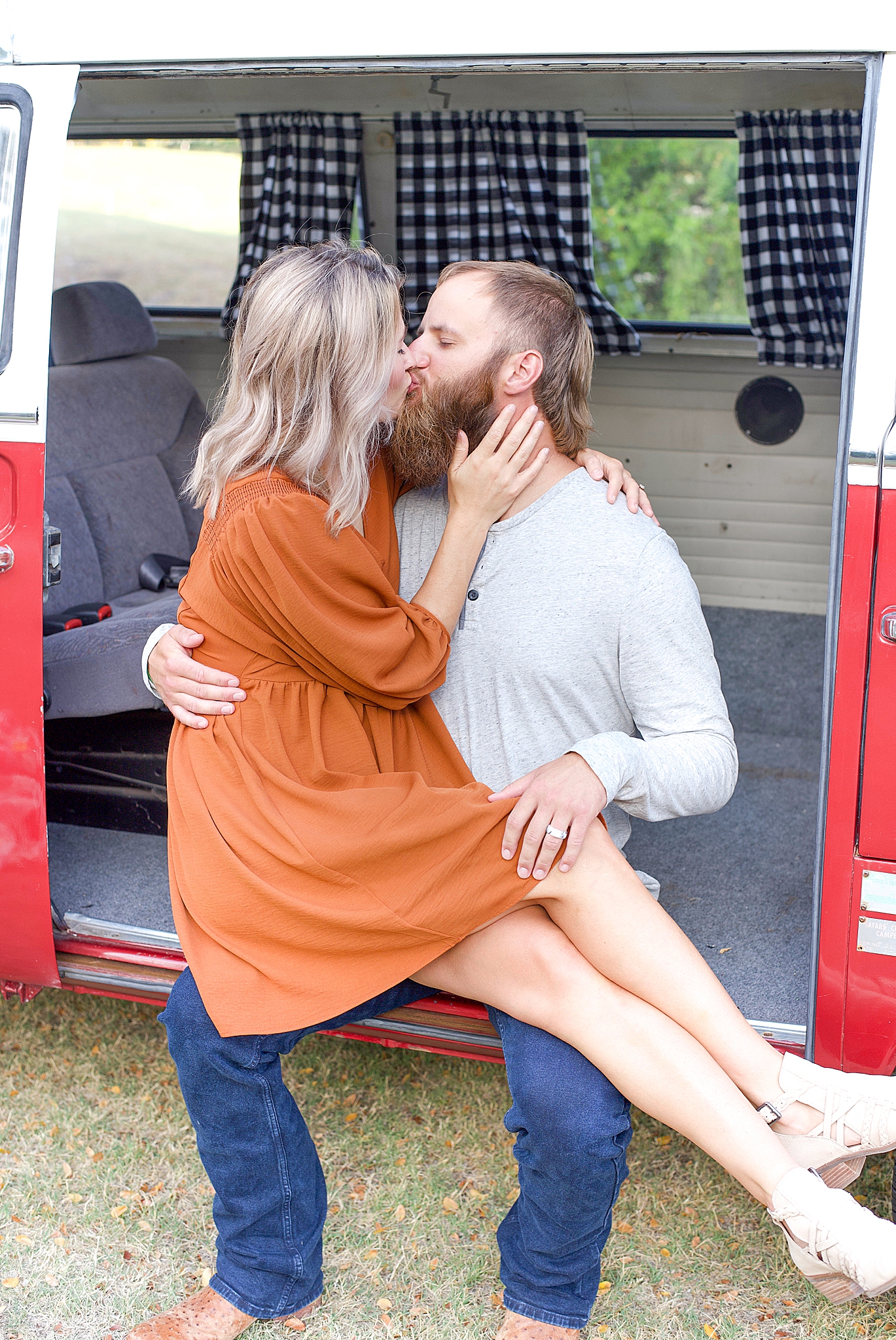 parents kiss on side of van in Texas