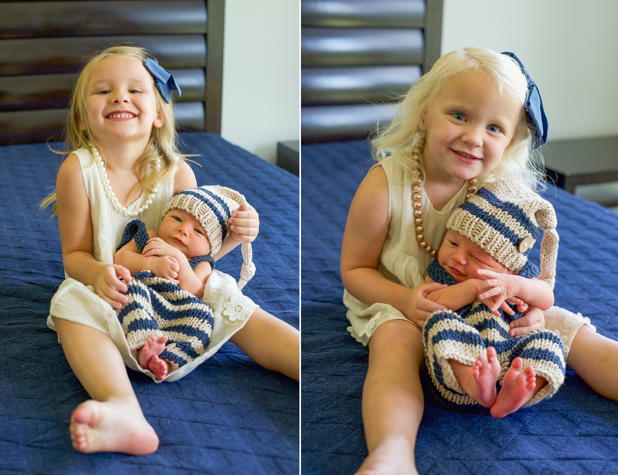 big sisters hold baby boy in blue and white knit outfit on bed during Little Elm Lifestyle Newborn Session