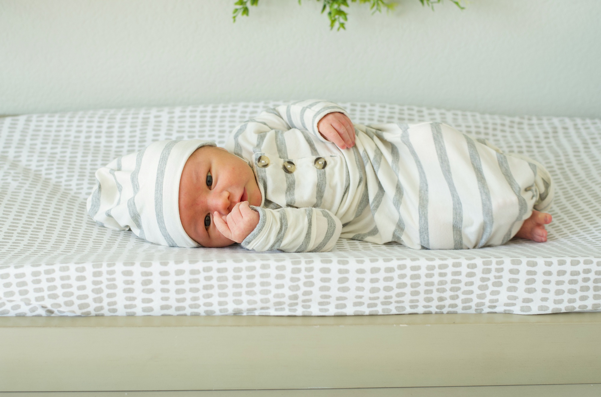 baby sleeps on changing table during Little Elm Lifestyle Newborn Session