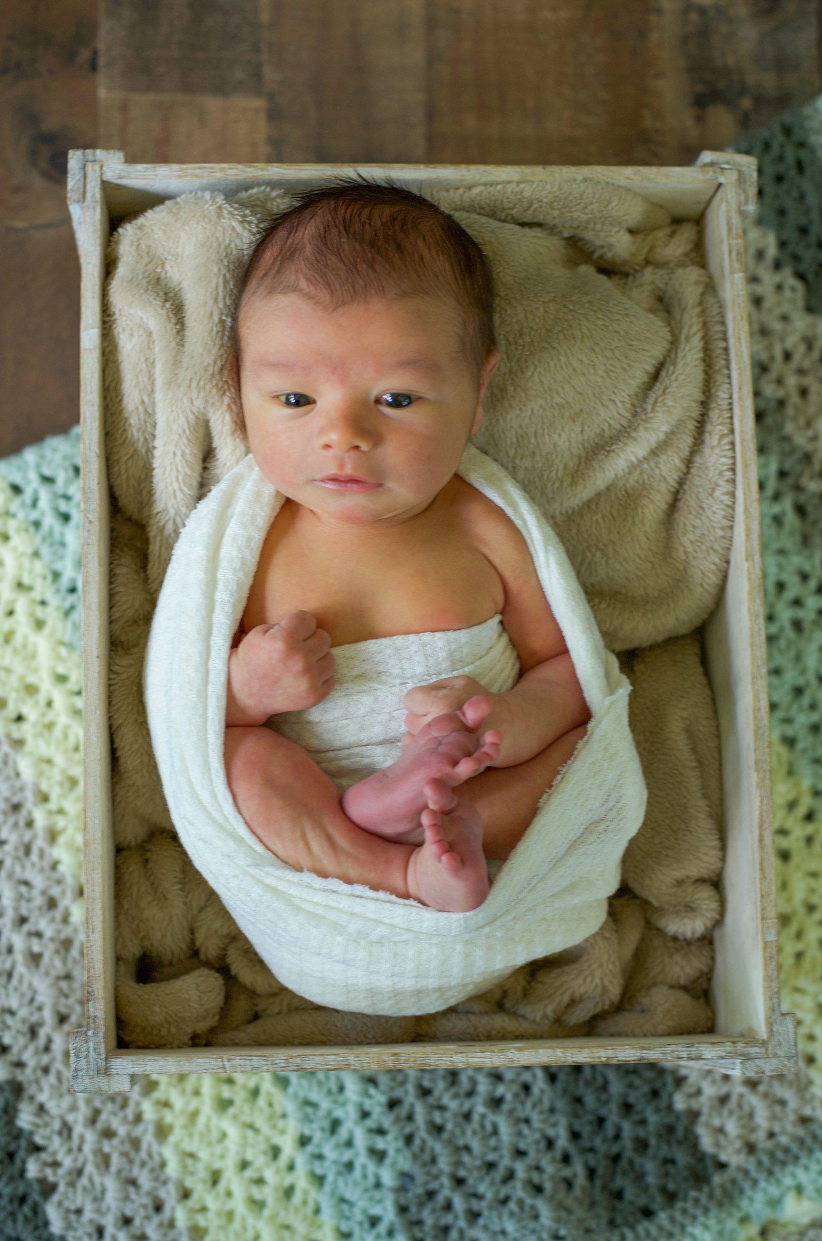 Little Elm Lifestyle Newborn Session with baby boy in crib