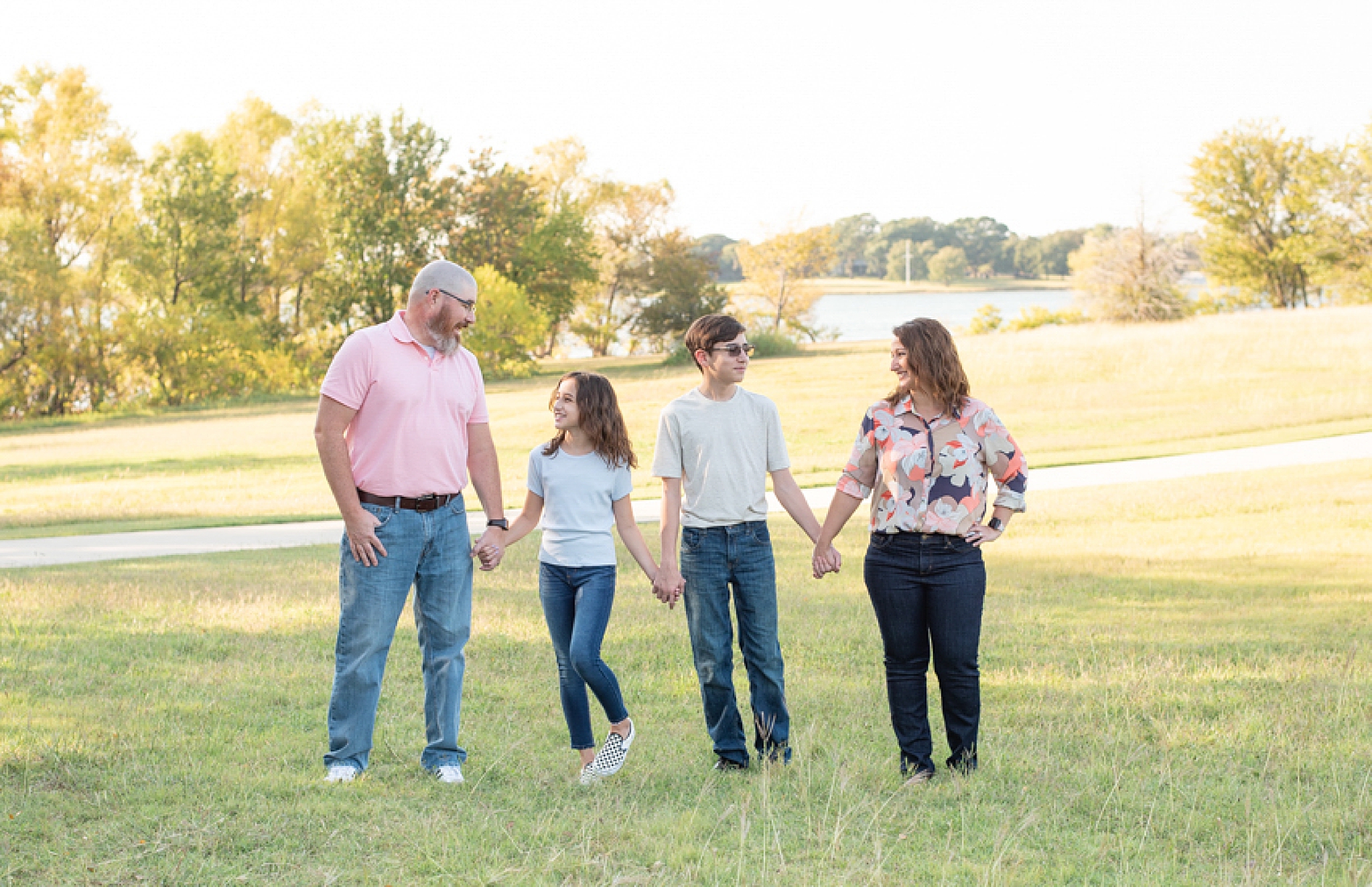 family poses together during Little Elm Park family sessions