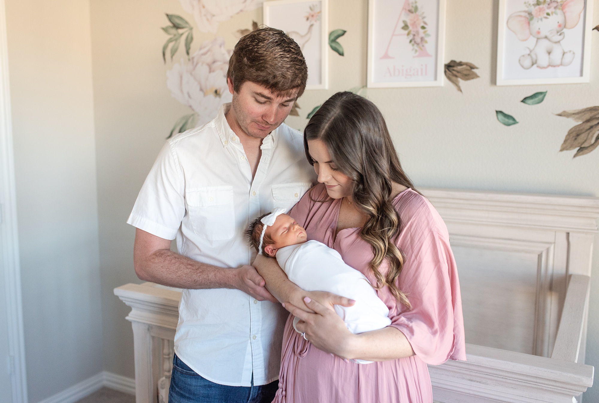 Texas lifestyle newborn session in nursery for baby girl