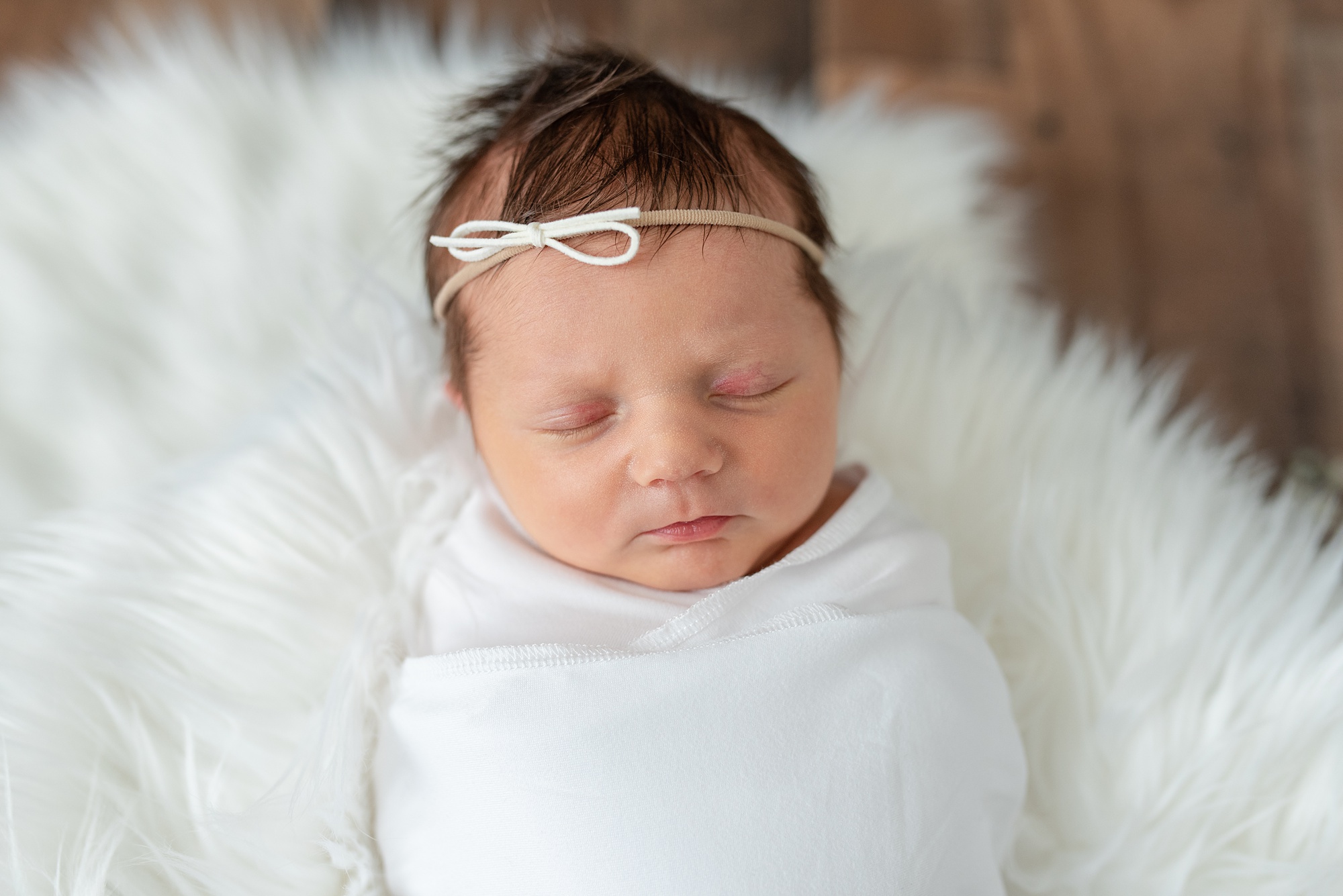 baby girl sleeps during Aubrey TX lifestyle newborn session 