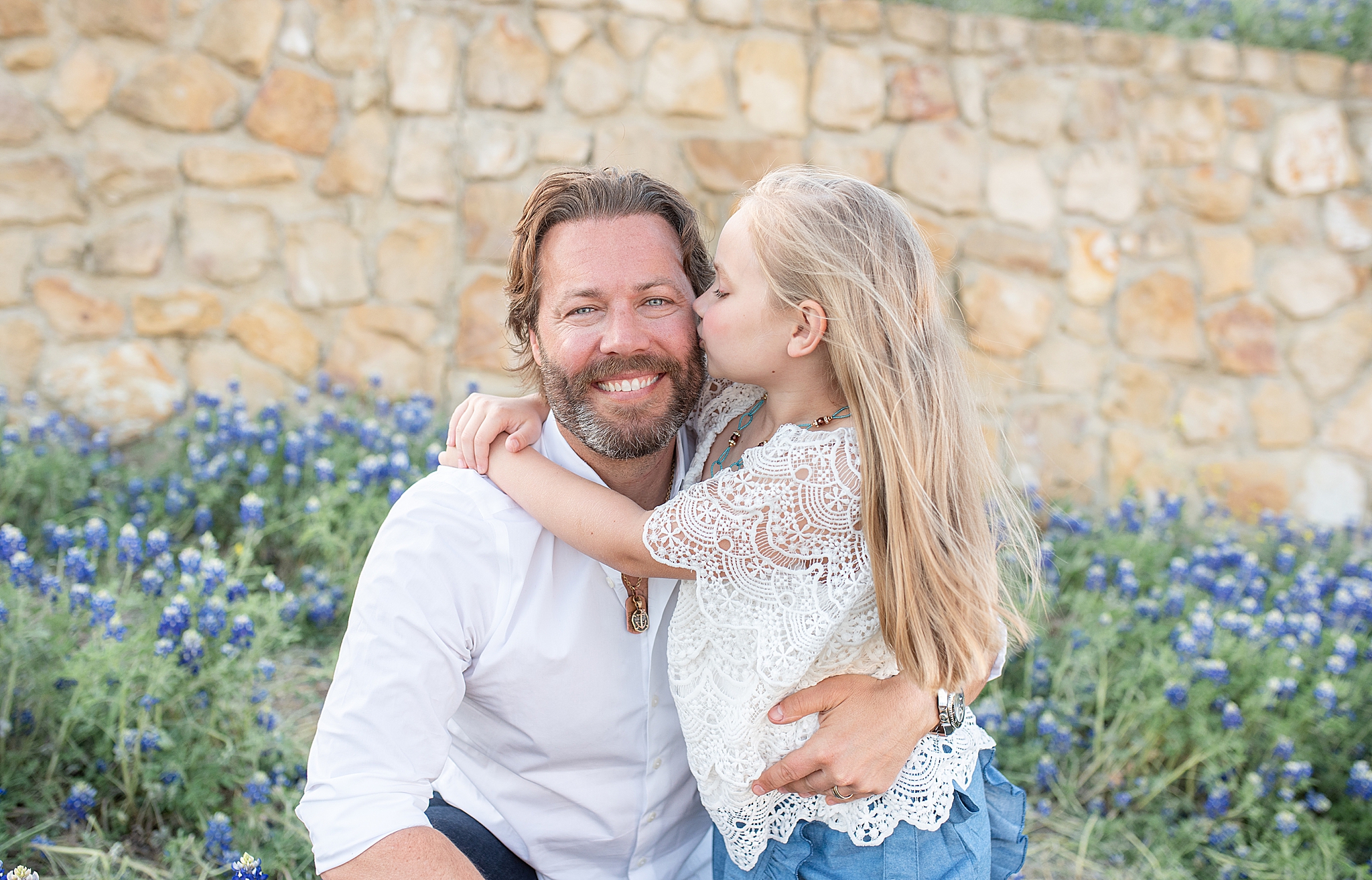 girl kisses dad during Frisco TX mini sessions