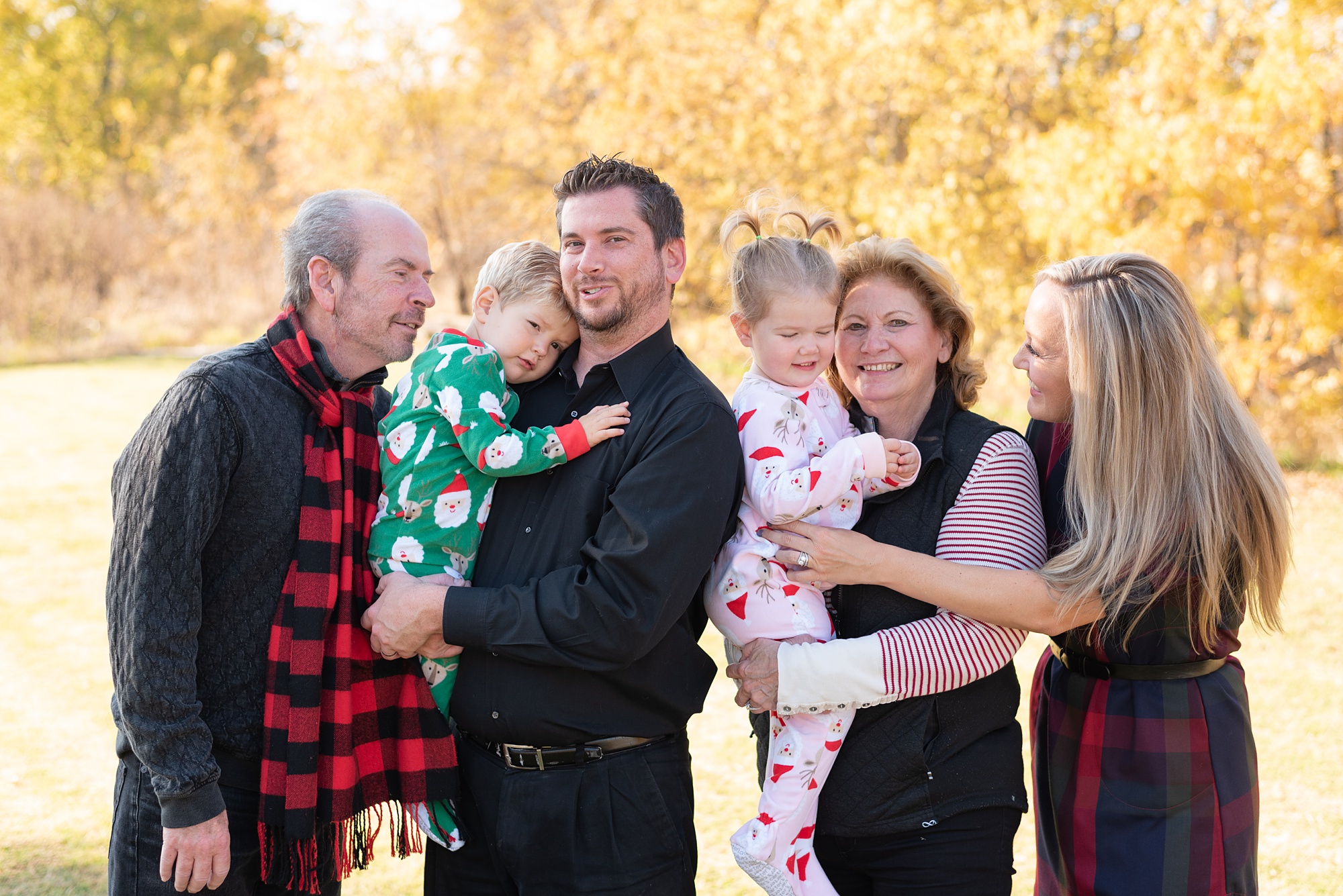 family poses with grandparents during TX family photos 