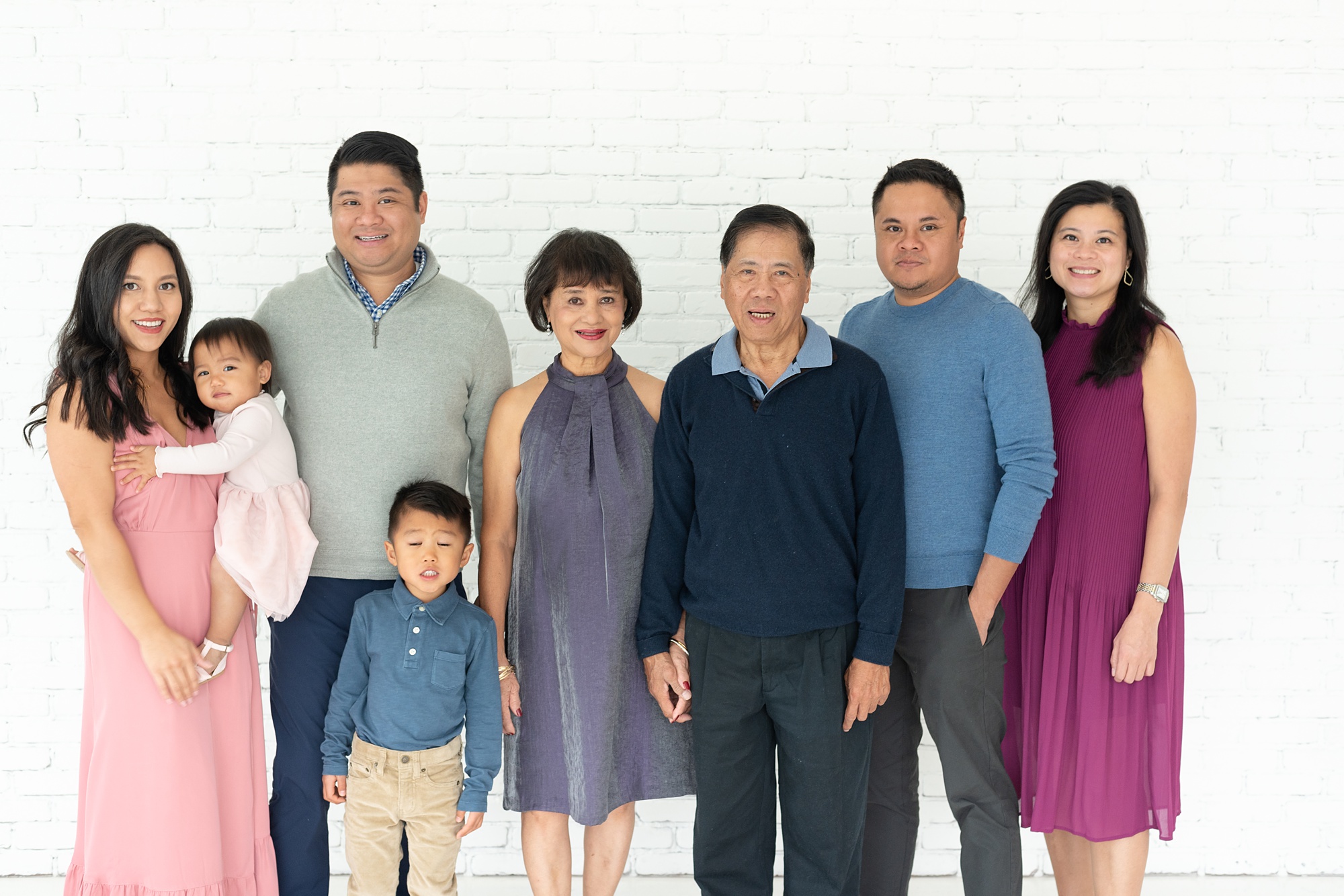 extend family poses together during Plano TX family photos 