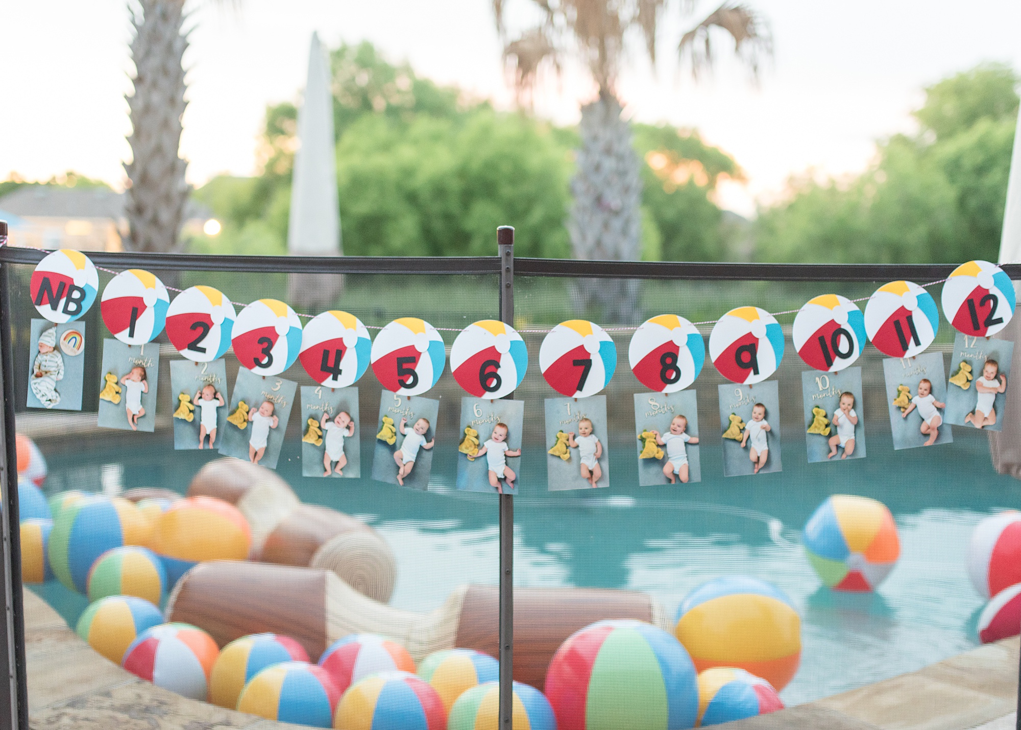 photo display for first birthday pool party