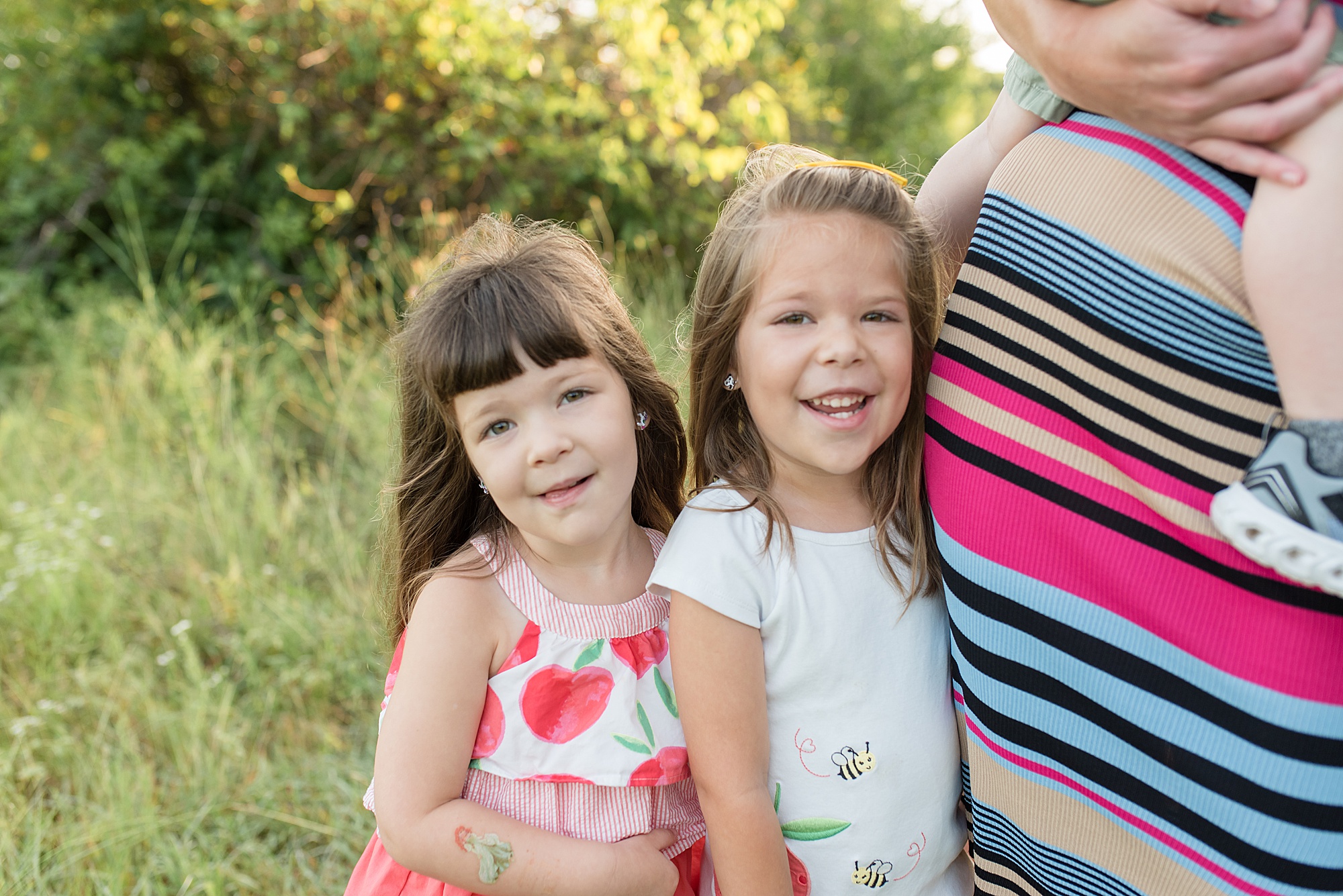 Little girls smile during Frisco Texas  Mommy + Me Session photographed by Lindsey Dutton Photography