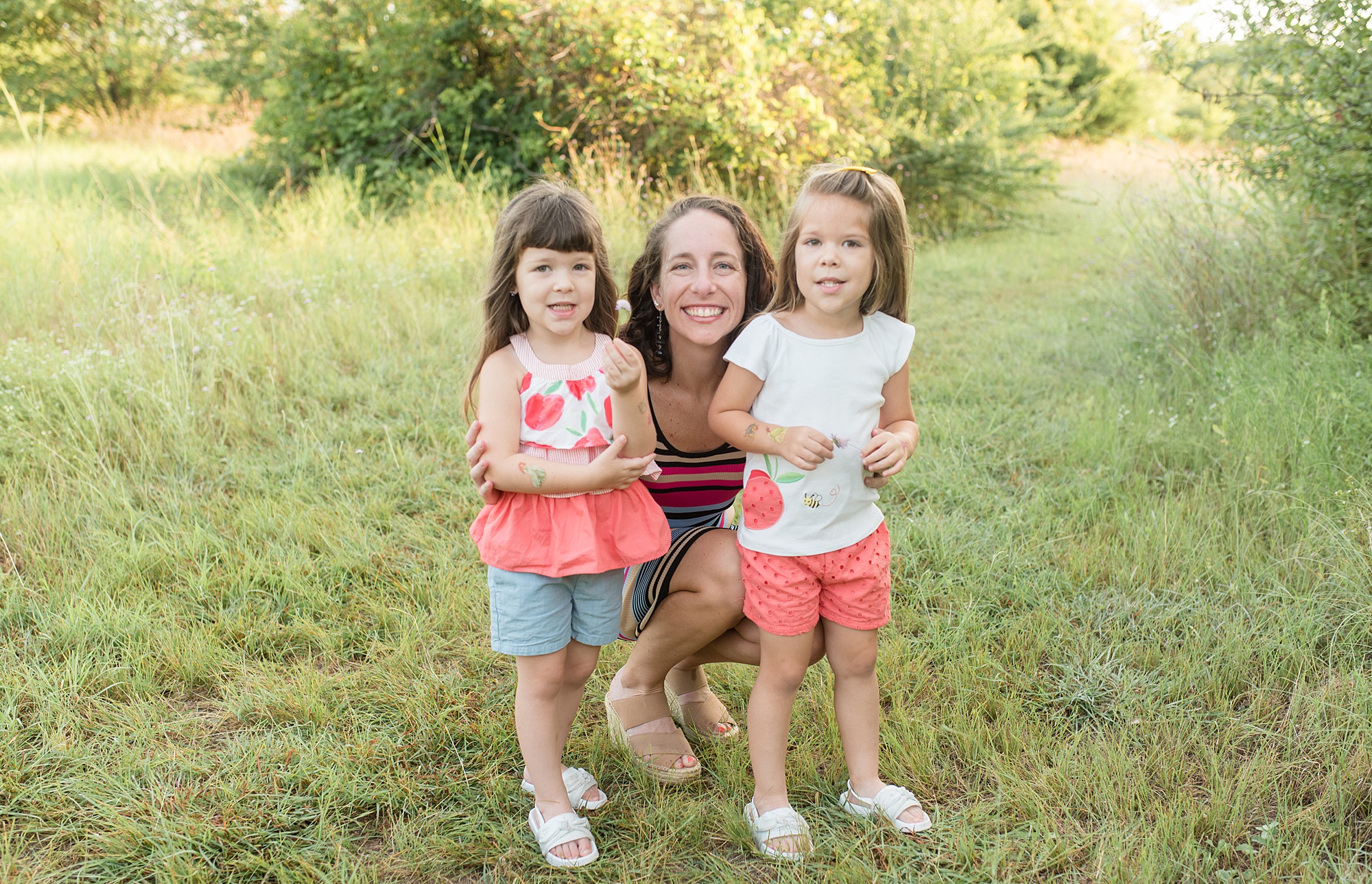 mom with her two daughters during Frisco Texas Mommy + Me Session photographed by Lindsey Dutton Photography