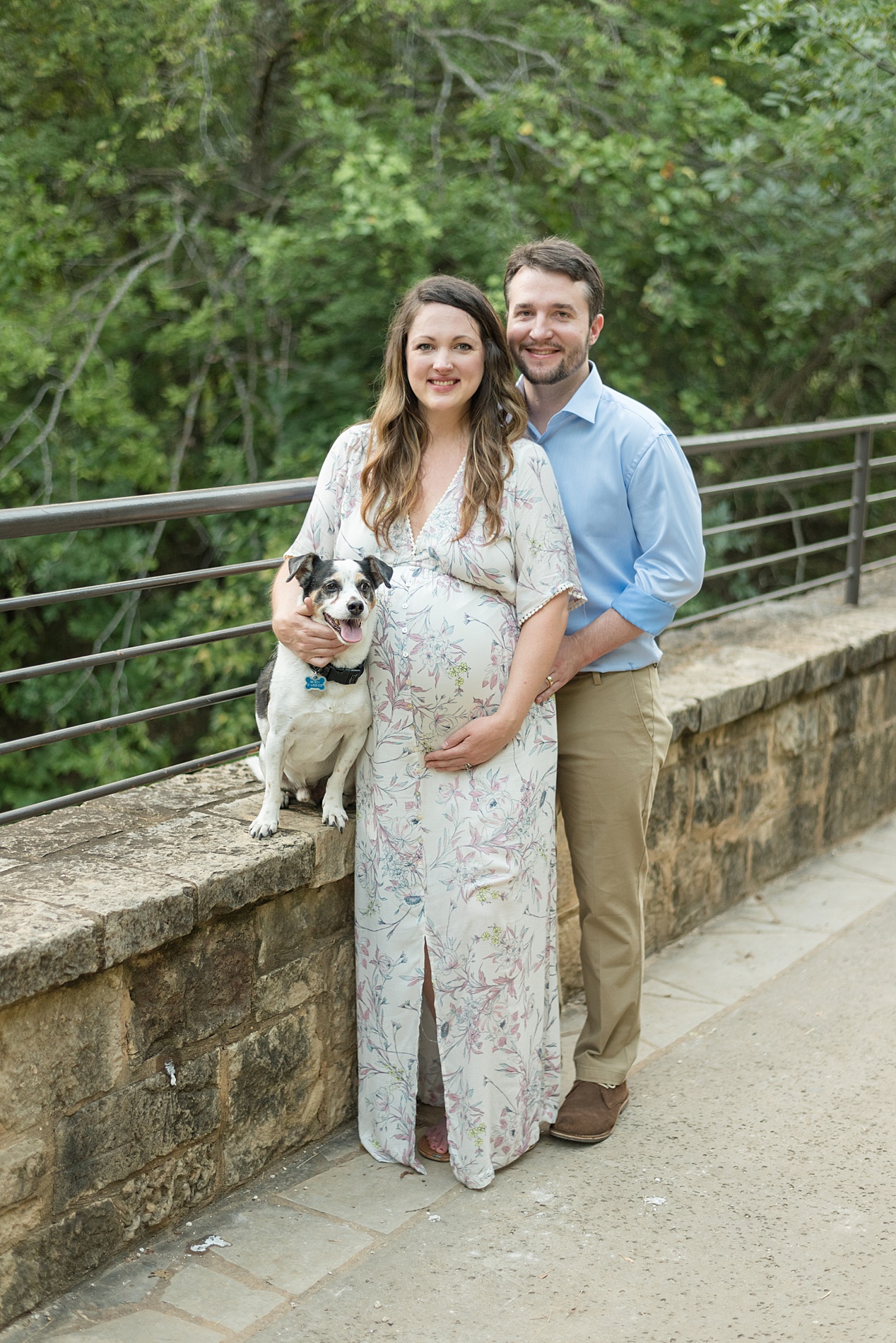 family of three including their dog during maternity session 