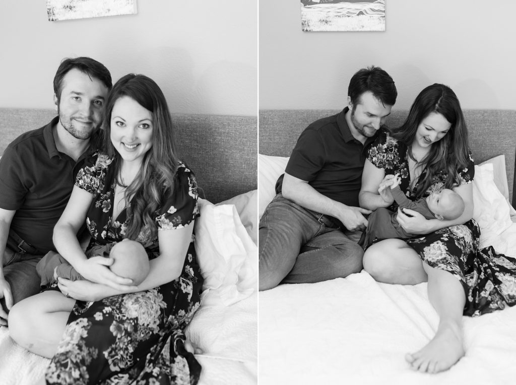 New parents admire their newborn baby boy during in-home lifestyle newborn session in TX