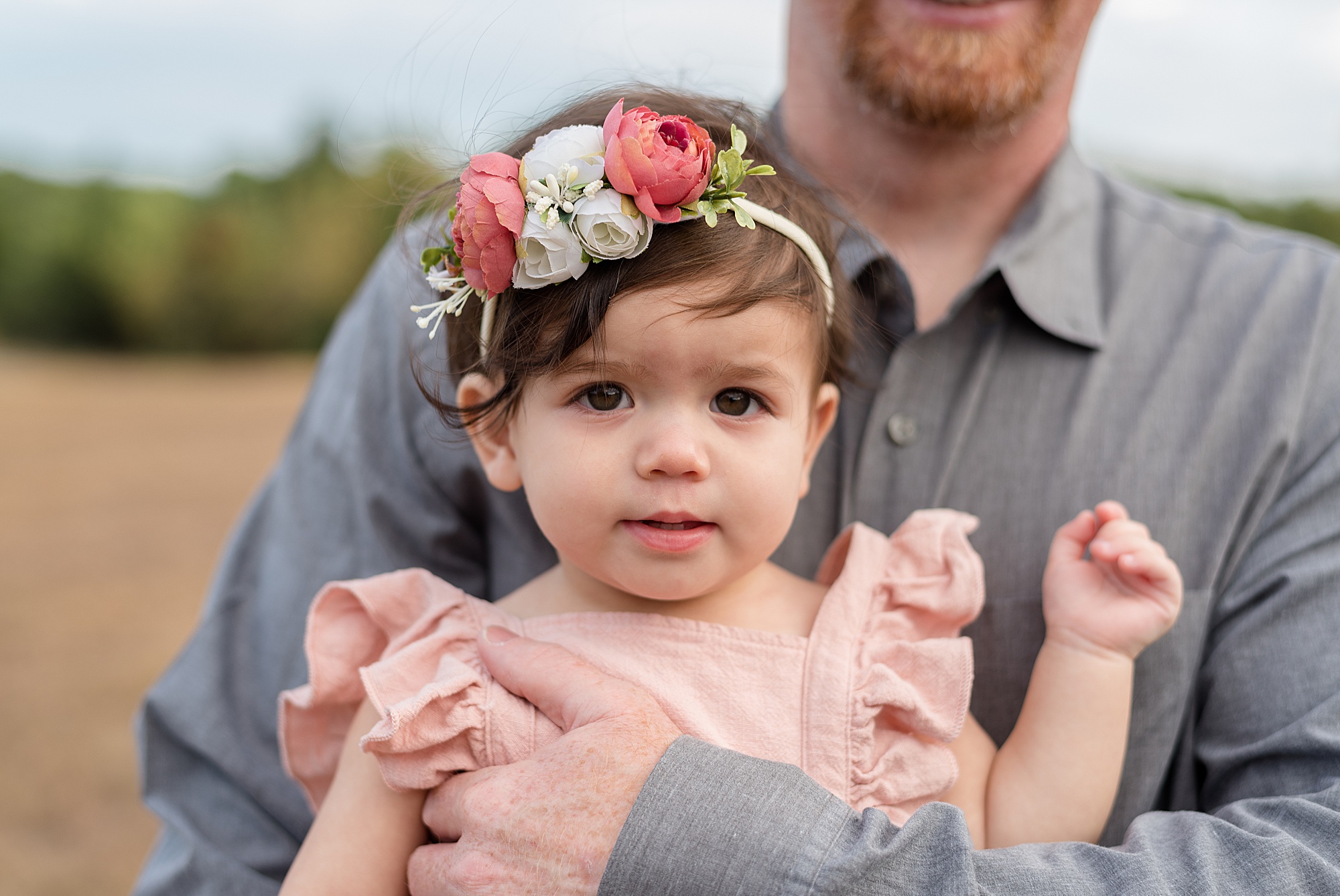 baby girl in flower headband