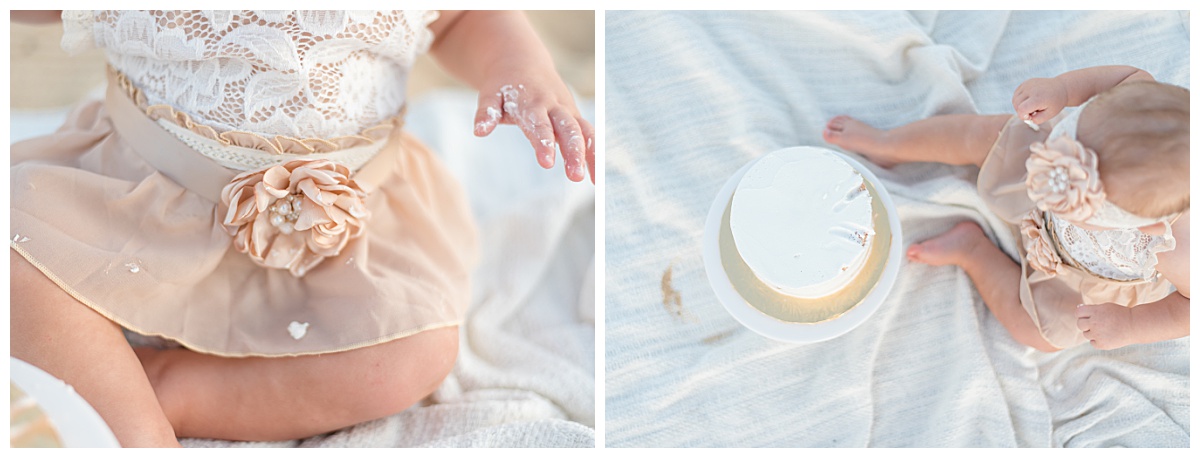 Baby girl with icing on her hands for her beach themed cake smash photos in North Dallas by Lindsey Dutton Photography, a Dallas Cake Smash Photographer. 