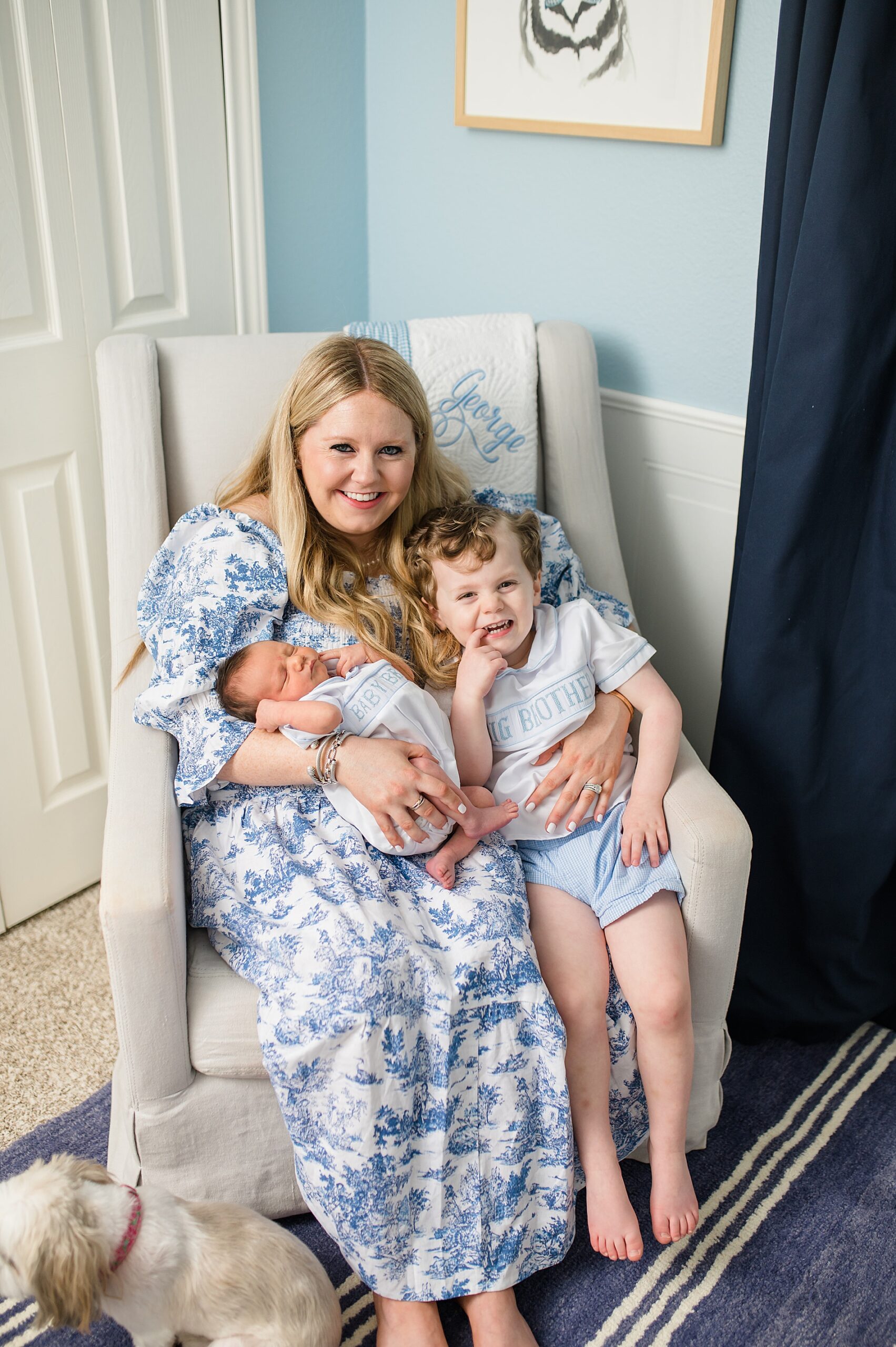 Mom snugging toddler and newborn taken by Lindsey Dutton Photography, a Dallas Newborn photographer
