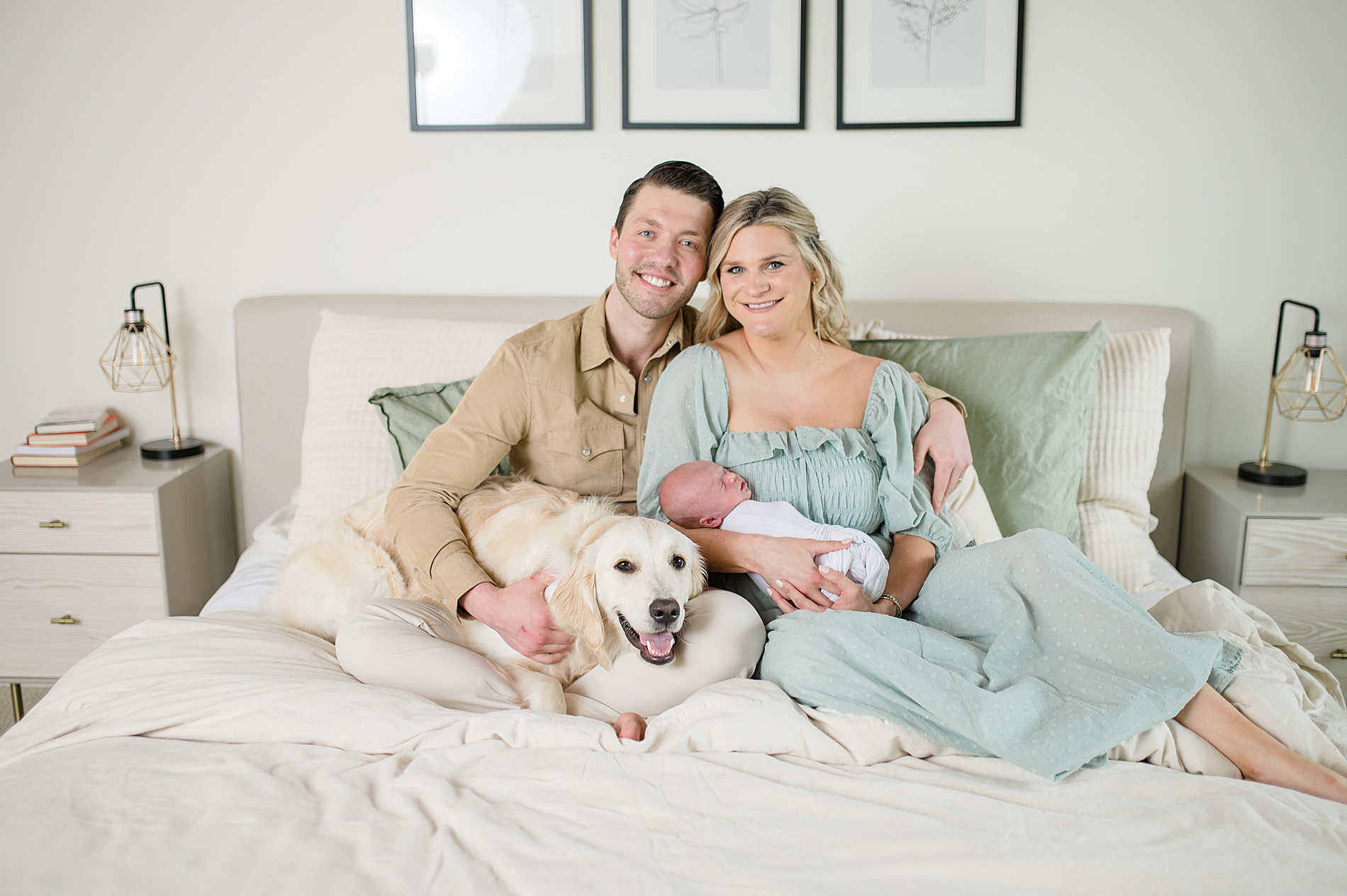 new family of three and their family dog sit on bed during in-home family session taken by Dallas Newborn photographer, Lindsey Dutton Photography
