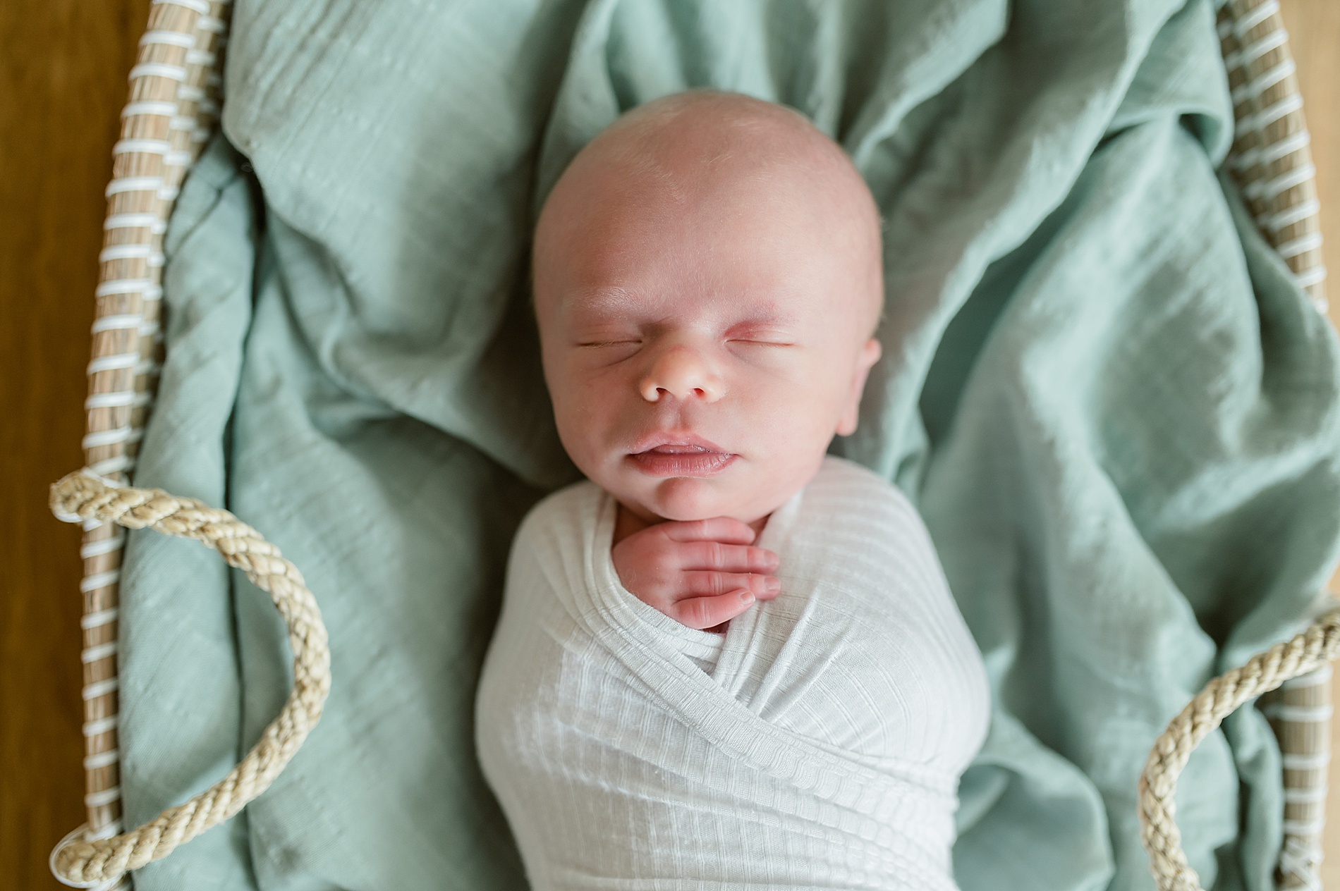 newborn sleeps in basket taken by Dallas Newborn photographer, Lindsey Dutton Photography
