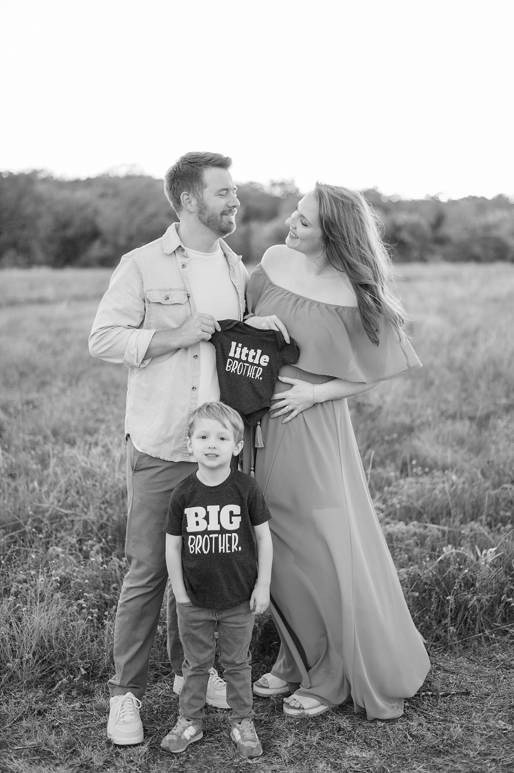 pregnancy announcement photoshoot with "big brother" "little brother" shirts photographed by Lindsey Dutton Photography, a Dallas maternity photographer
