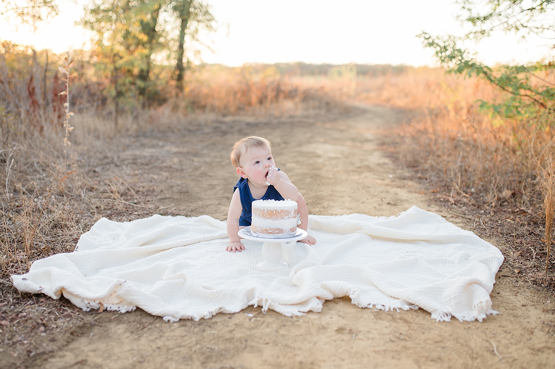 outdoor cake smash session photographed by Lindsey Dutton Photography, a Dallas newborn photographer
