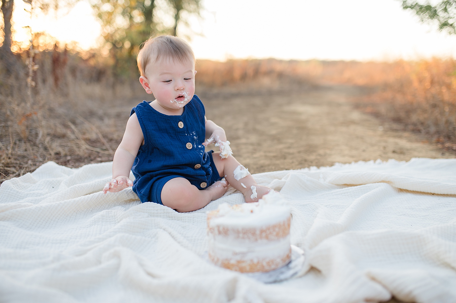 1 year cake smash session taken by Lindsey Dutton Photography, a Dallas newborn photographer
