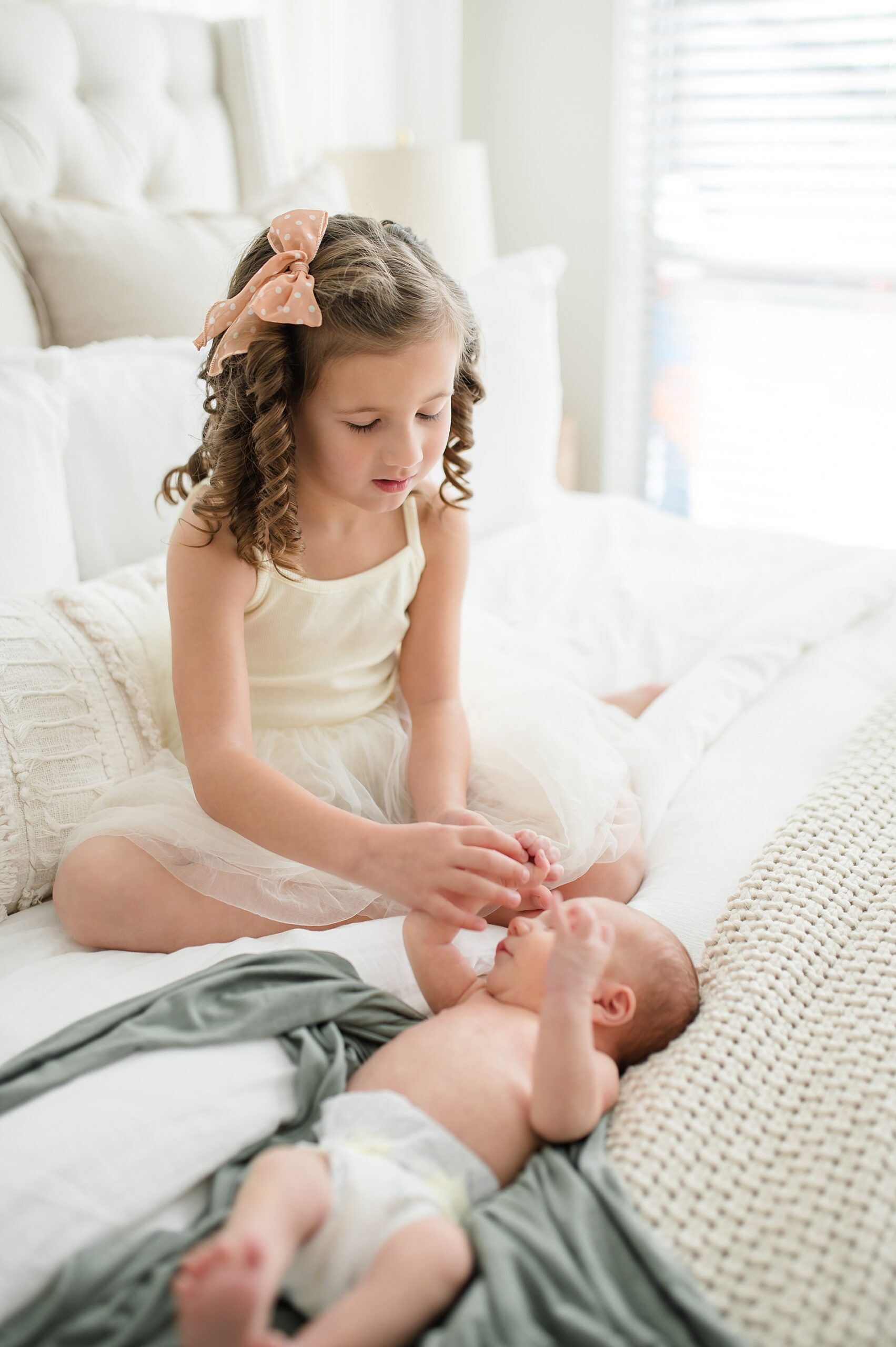 big sister with newborn brother photographed by Lindsey Dutton Photography, a Dallas newborn photographer
