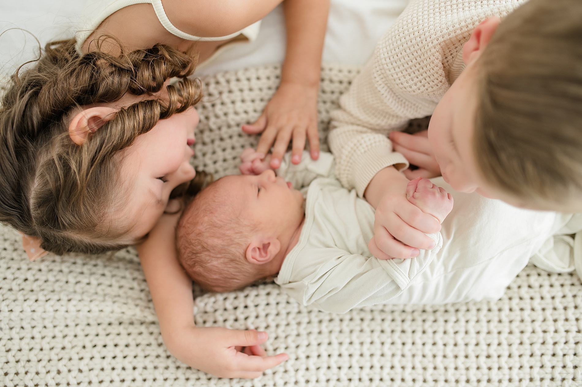 How to Prepare Siblings For Newborn Photos | candid portraits from newborn session taken by Lindsey Dutton Photography, a Dallas newborn photographer
