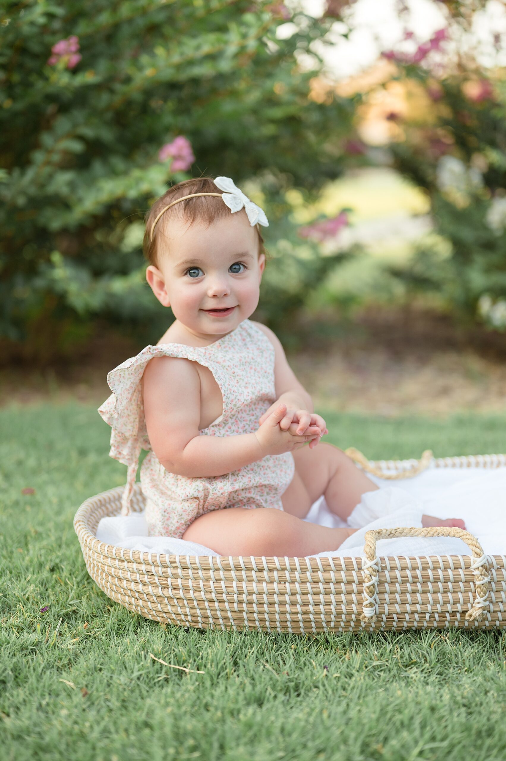 little girl in bassinet form Summer Crepe Myrtle Family Session taken by Lindsey Dutton Photography, a Dallas family photographer
