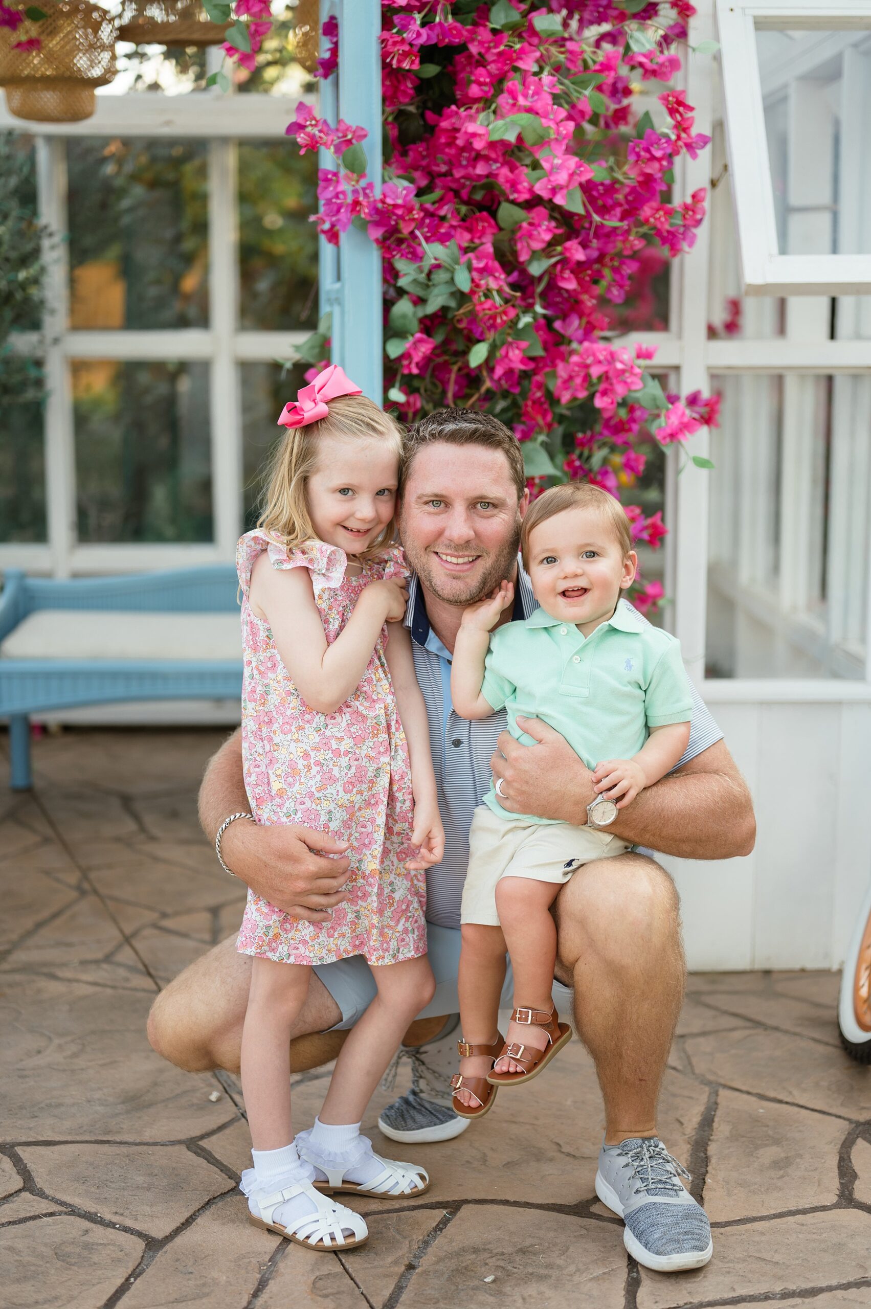 dad with two kids from Timeless Greenhouse Photoshoots taken by Lindsey Dutton Photography, a Dallas Family photographer