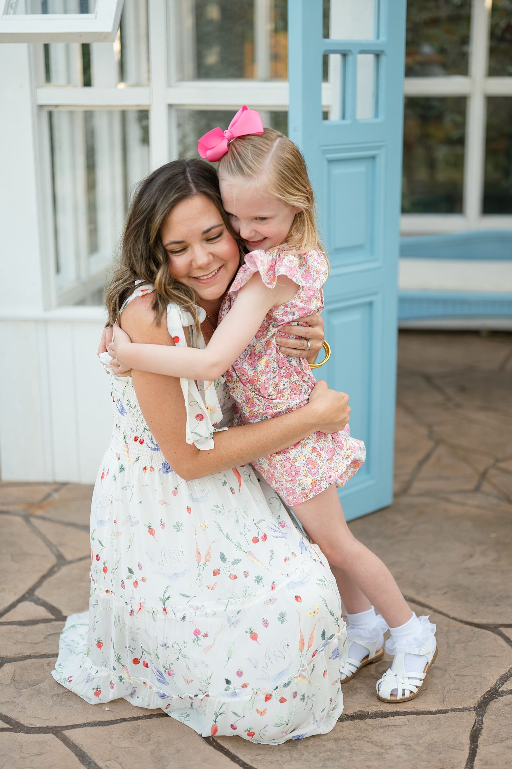 mom hugs daughter in mommy and me photos photographed by Lindsey Dutton Photography, a Dallas Family photographer
