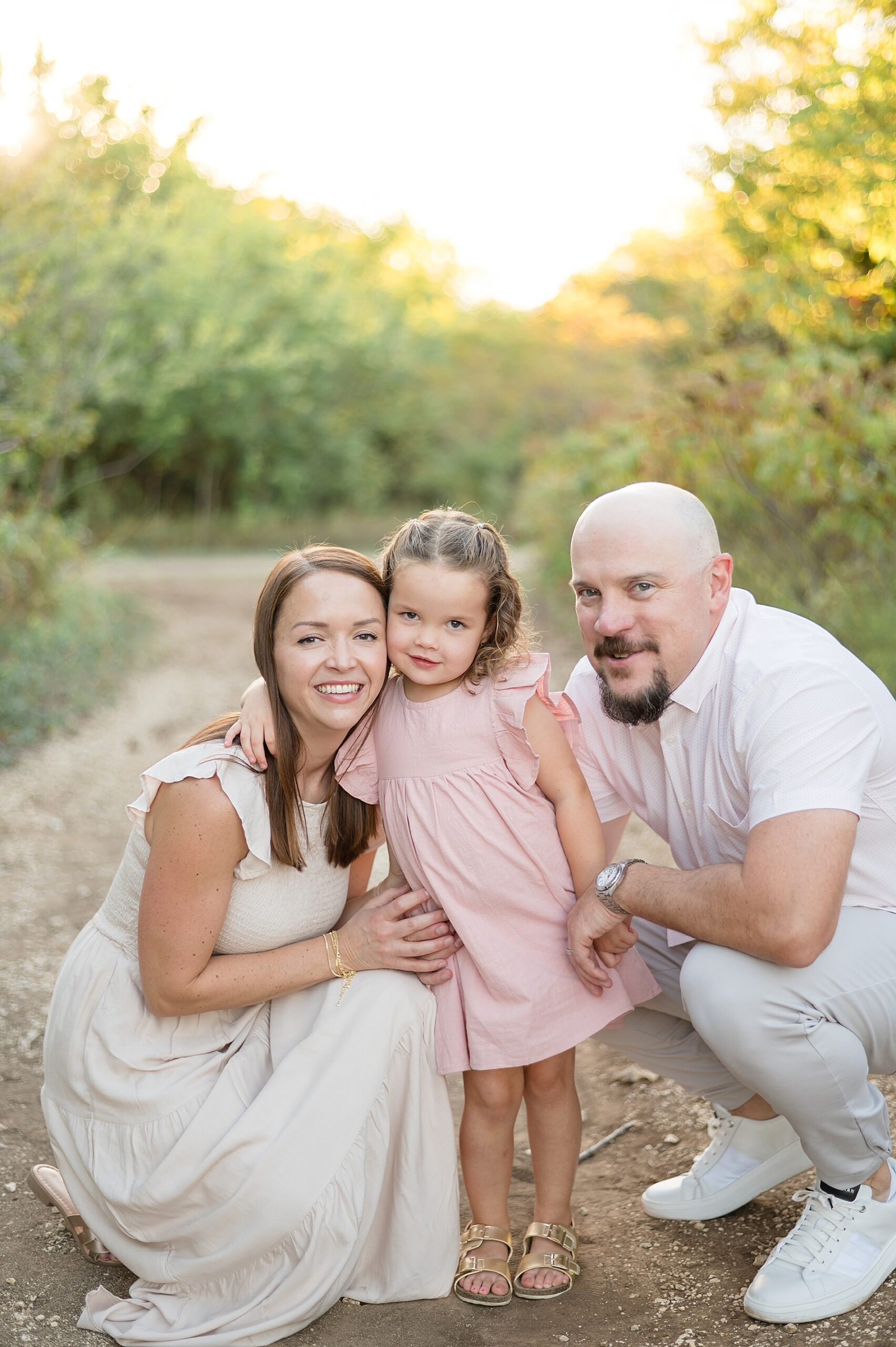 Family of three together during photoshoot | Choosing the Right Photography Package for Your Family photographed by Lindsey Dutton Photography, a Dallas Family photographer
