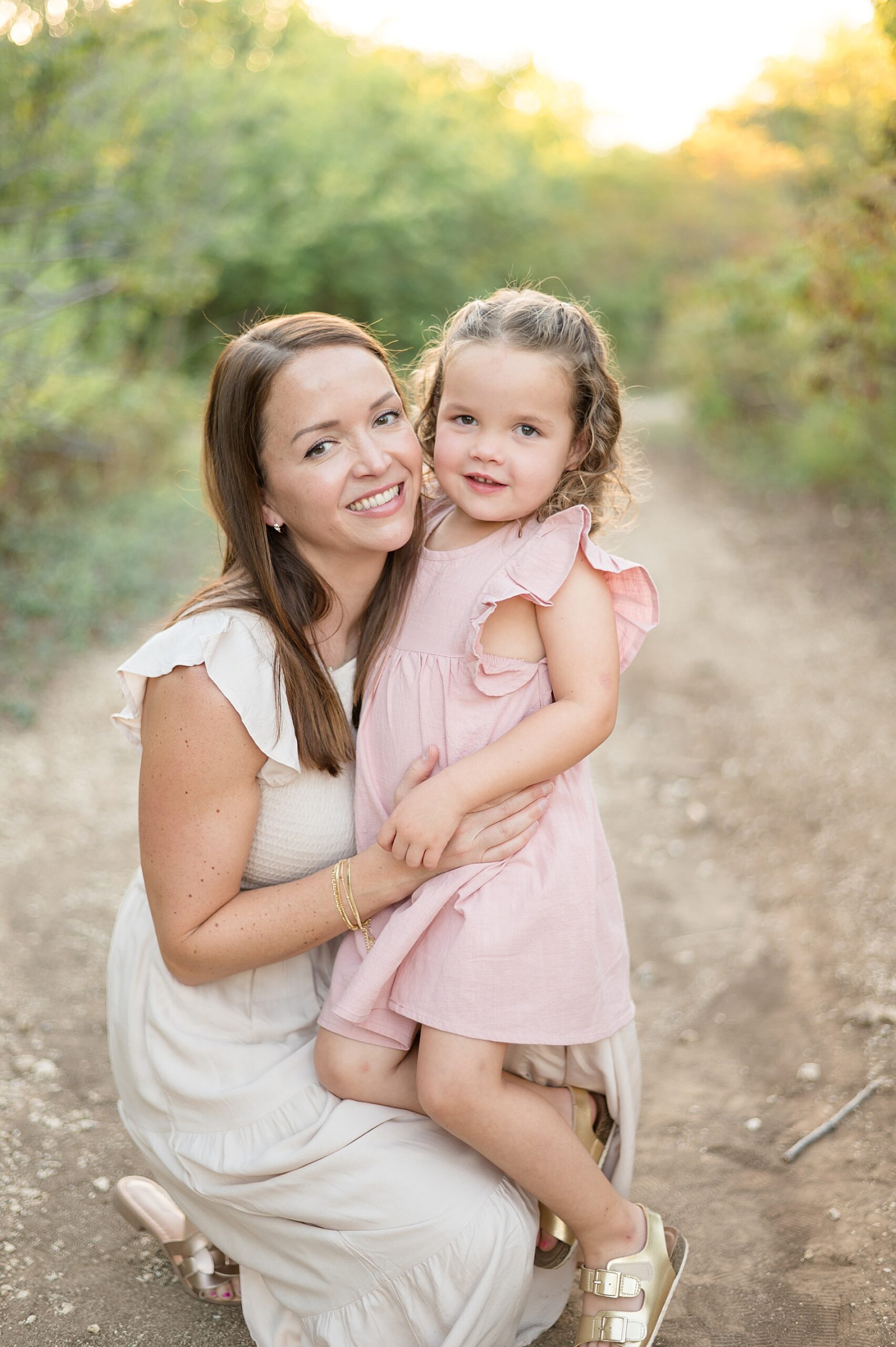 mom with daughter during family session taken by Lindsey Dutton Photography, a Dallas Family photographer