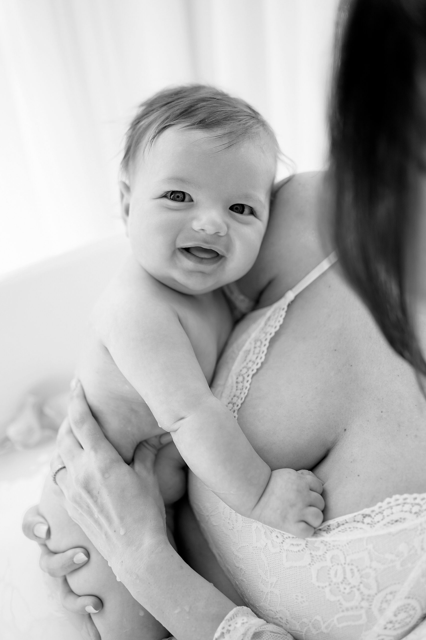 3-month old baby smiles 