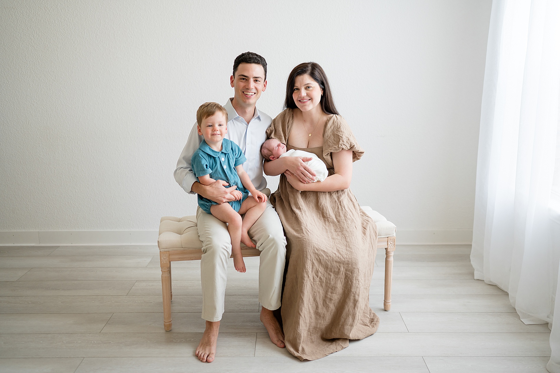 family photo from timeless studio newborn session by studio newborn photographer in Prosper, TX