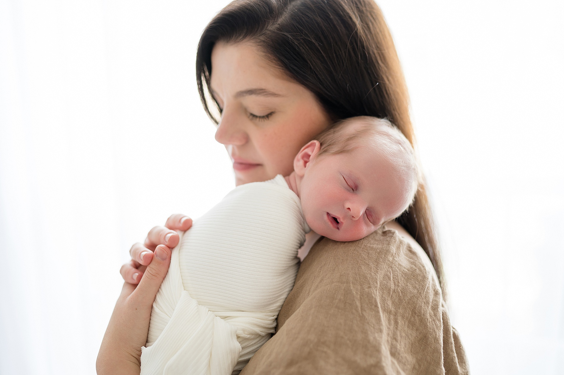 newborn sleeps on mom's shoulder | Simple newborn photography in Prosper Texas