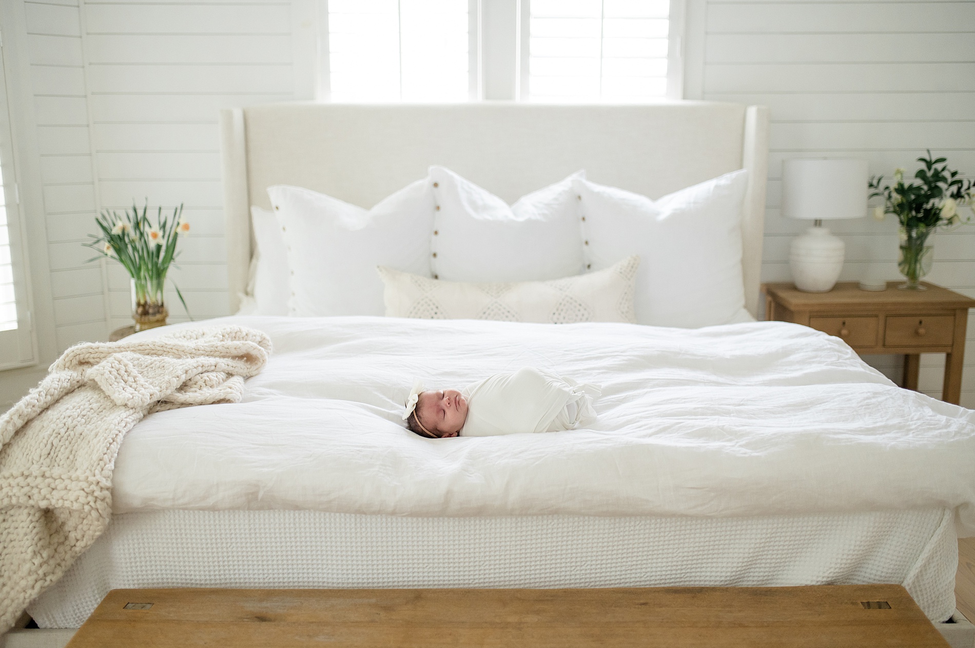 baby girl sleeps on bed