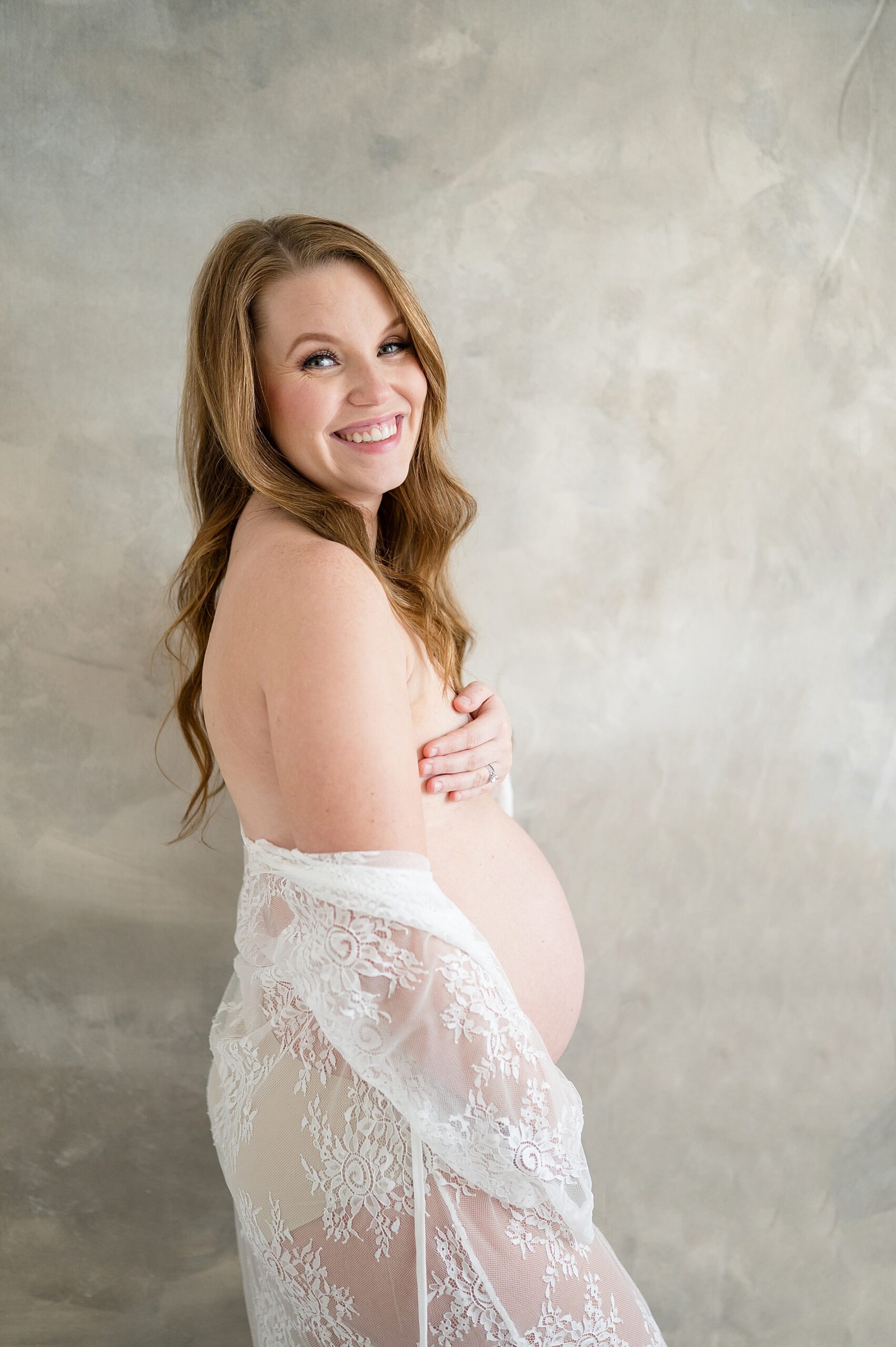 Dallas motherhood photographer captures Intimate Studio Maternity Session