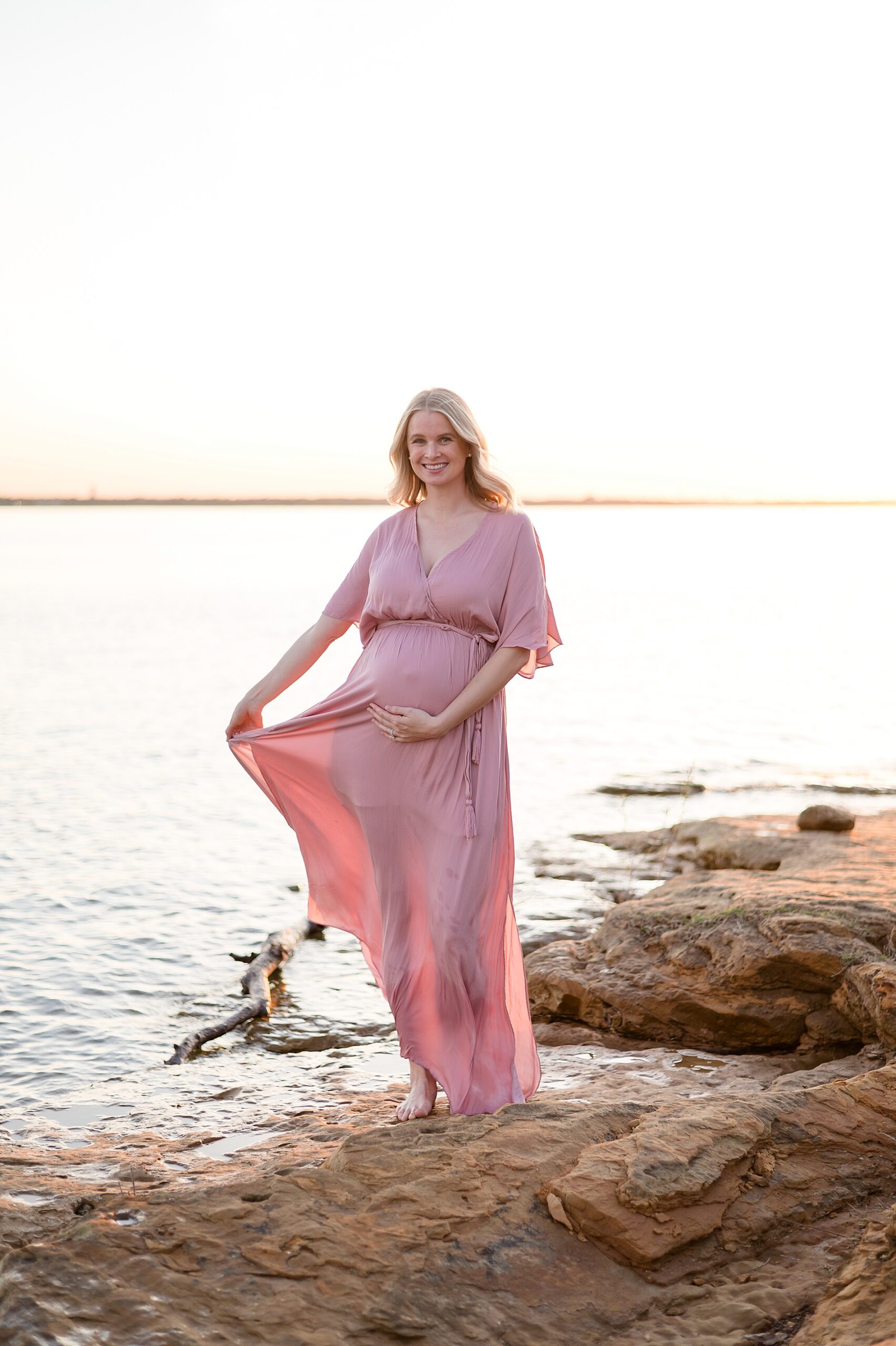 sunset maternity photos on rocky shore at Murrell Lake