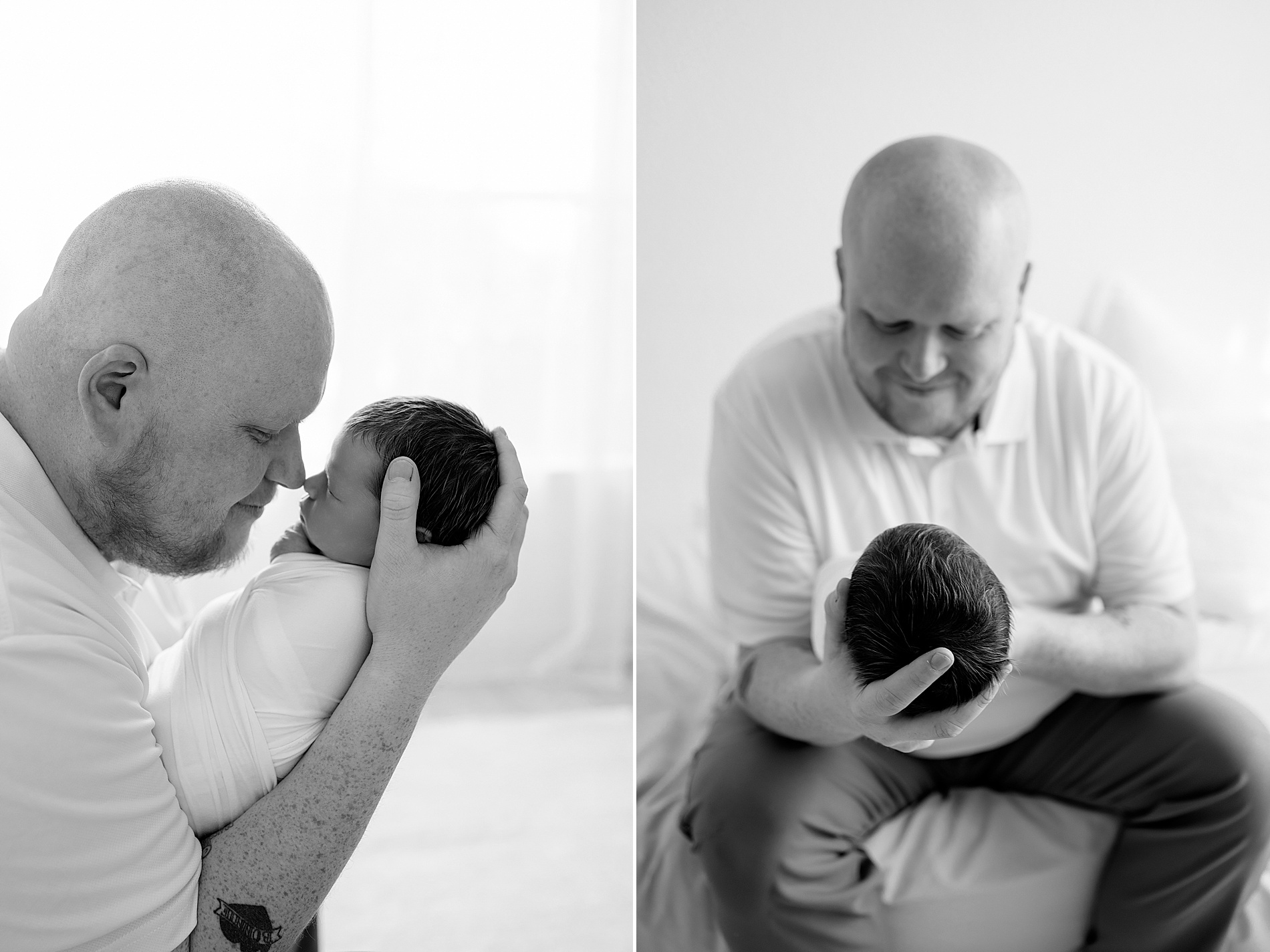 dad holds newborn boy