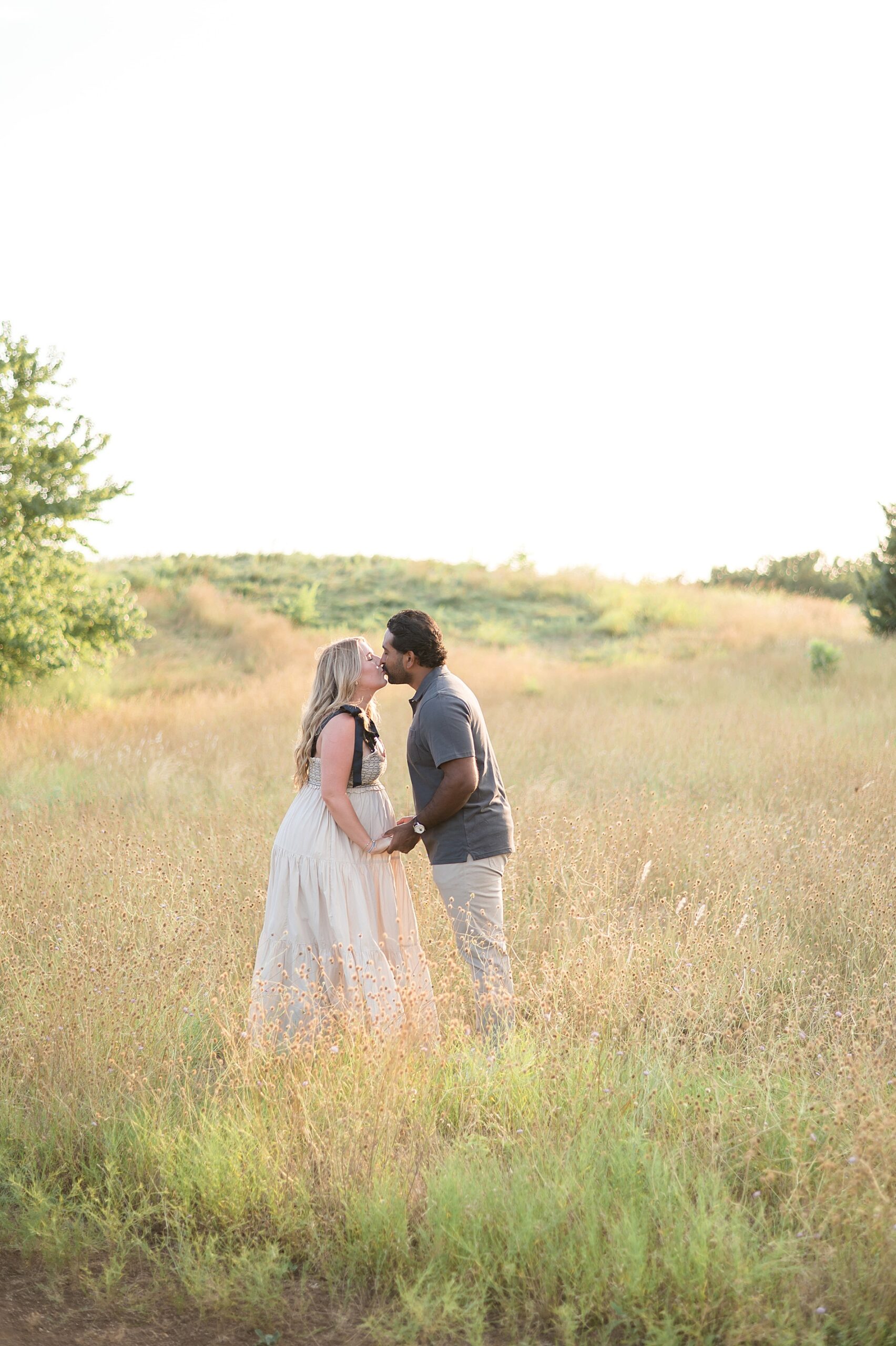 timeless maternity portraits in dreamy field setting