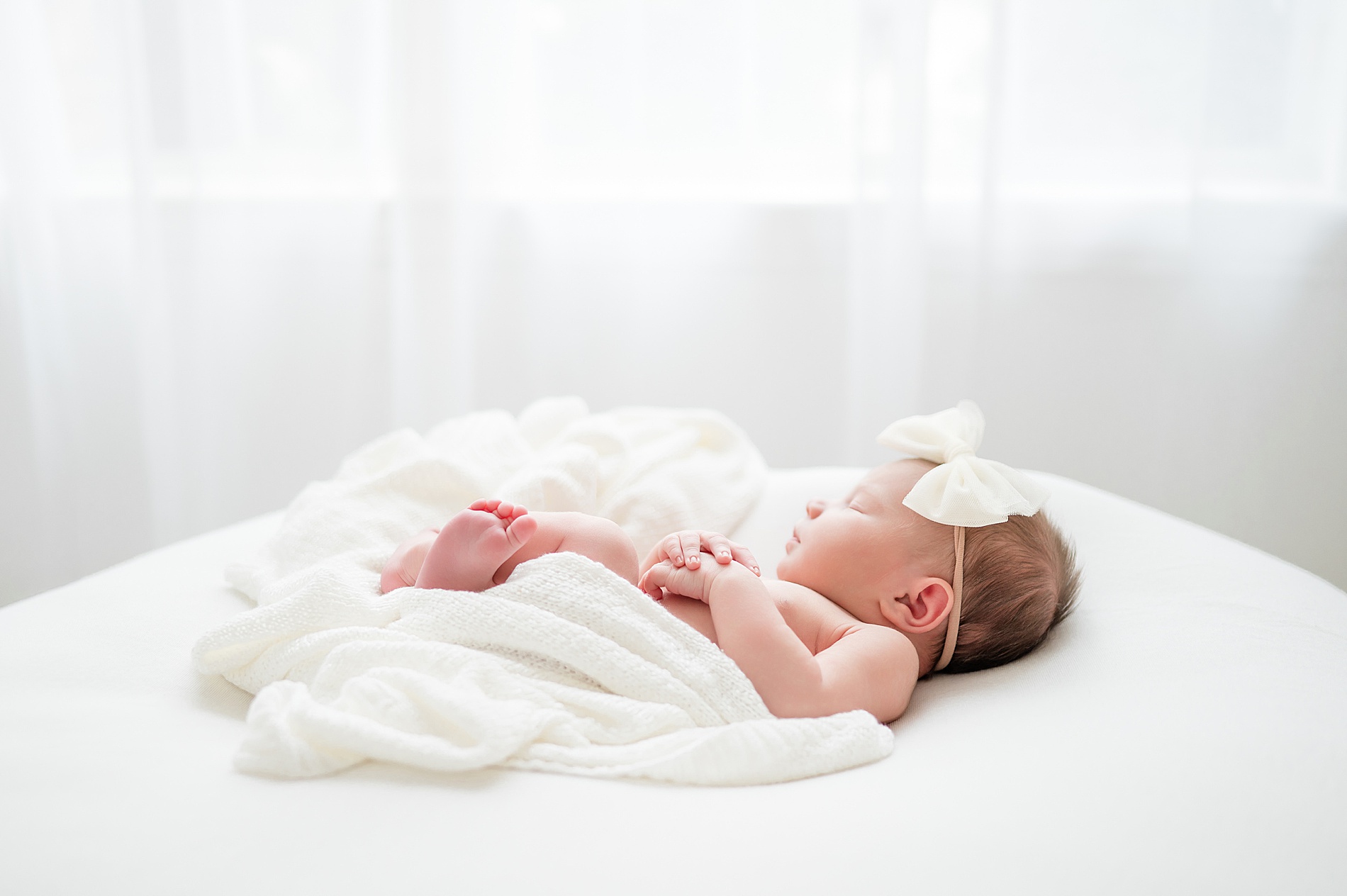 Little Elm newborn photographer captures little girl sleeping by window | Light and airy Studio Newborn Photography