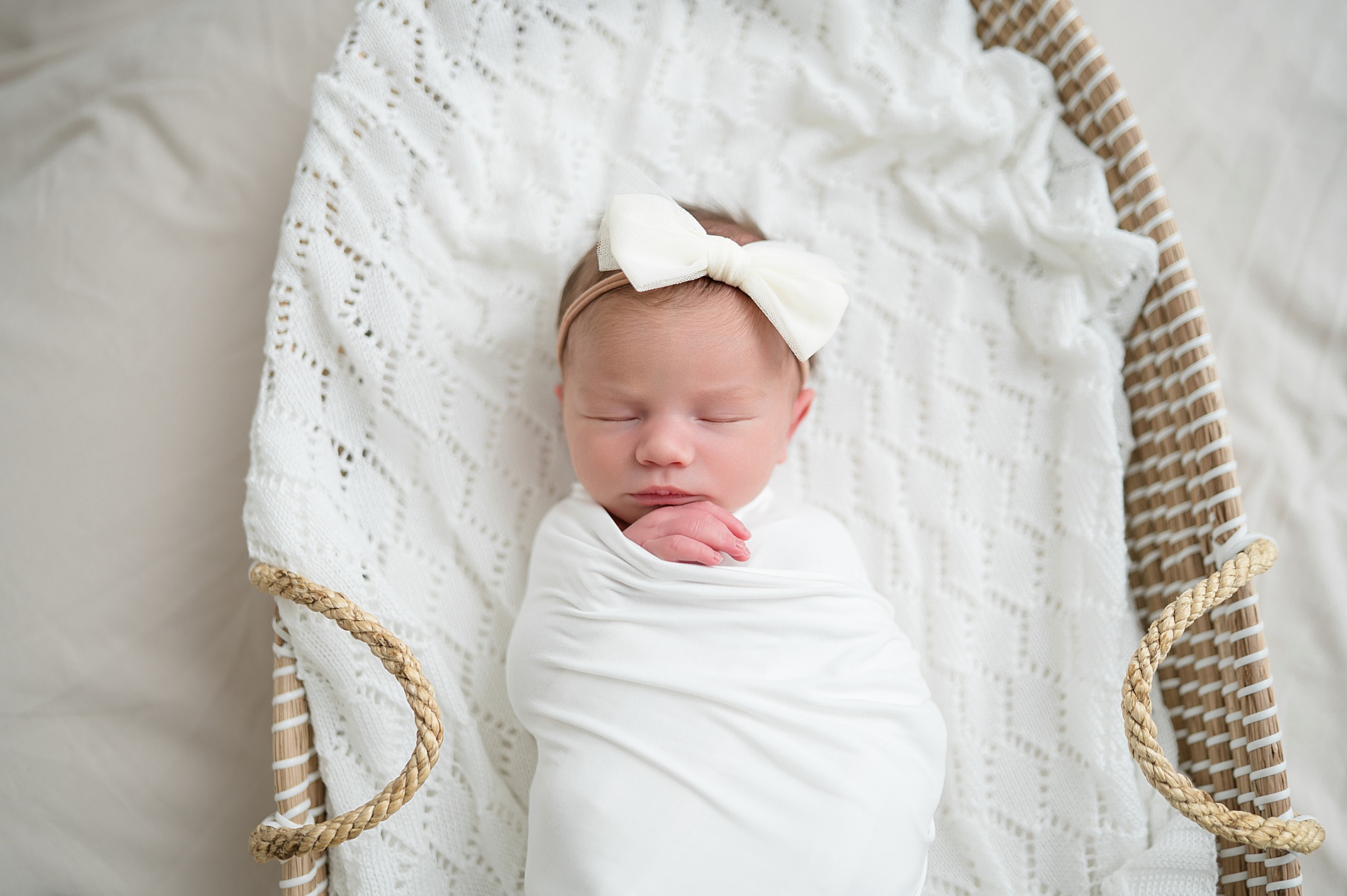 newborn sleeps in basket | Studio Newborn Photography | The Perfect Choice to Capture Your Baby’s Portraits