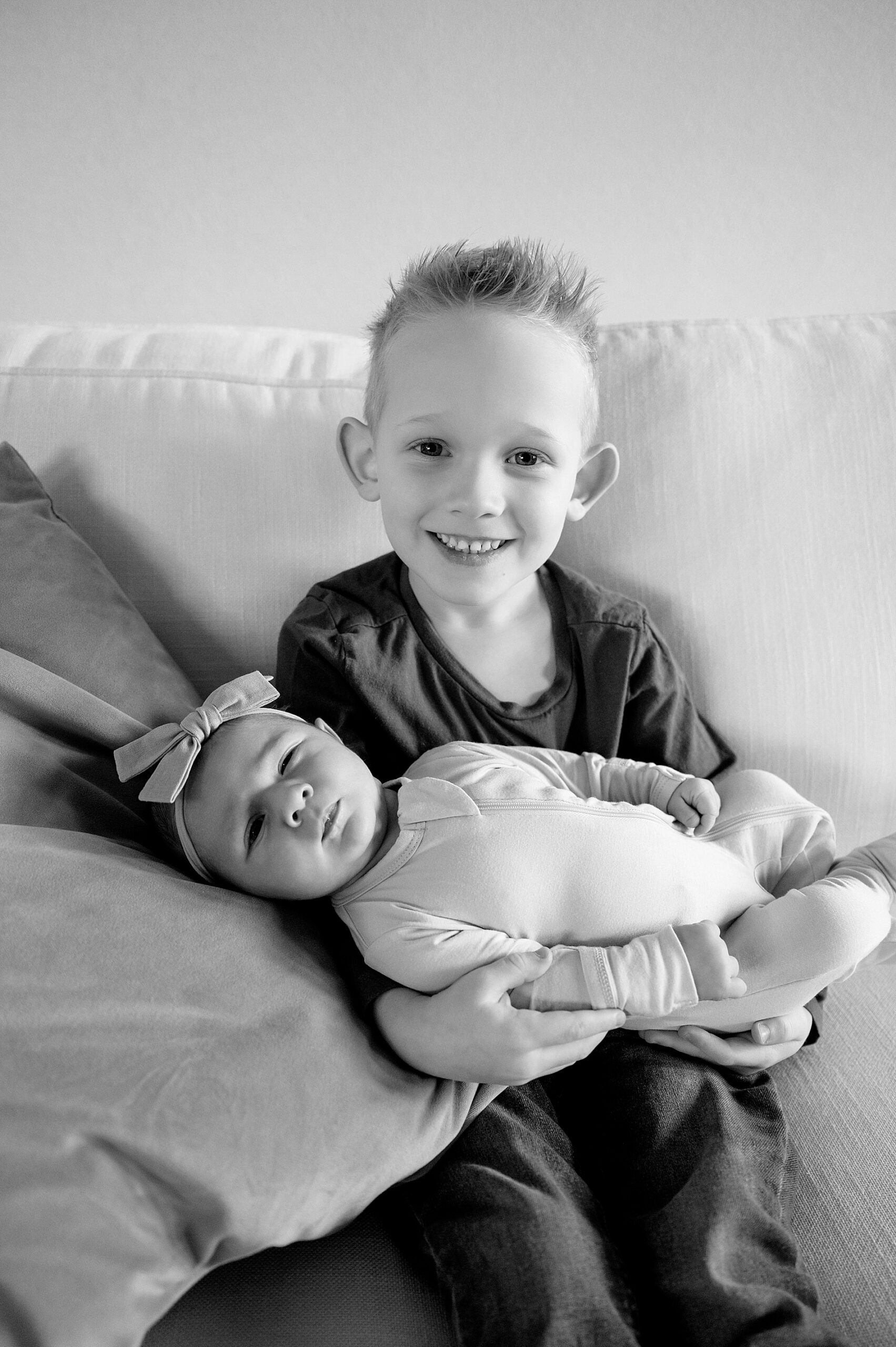 big brother with little sister during Newborn Session With siblings
 