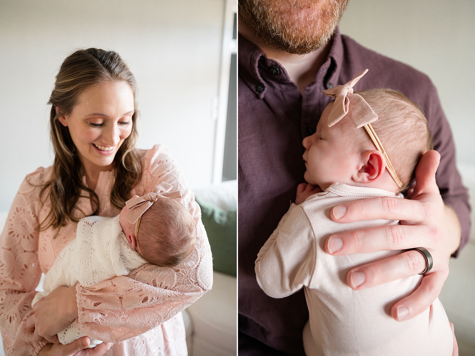 parents cradle newborn girl in arms 