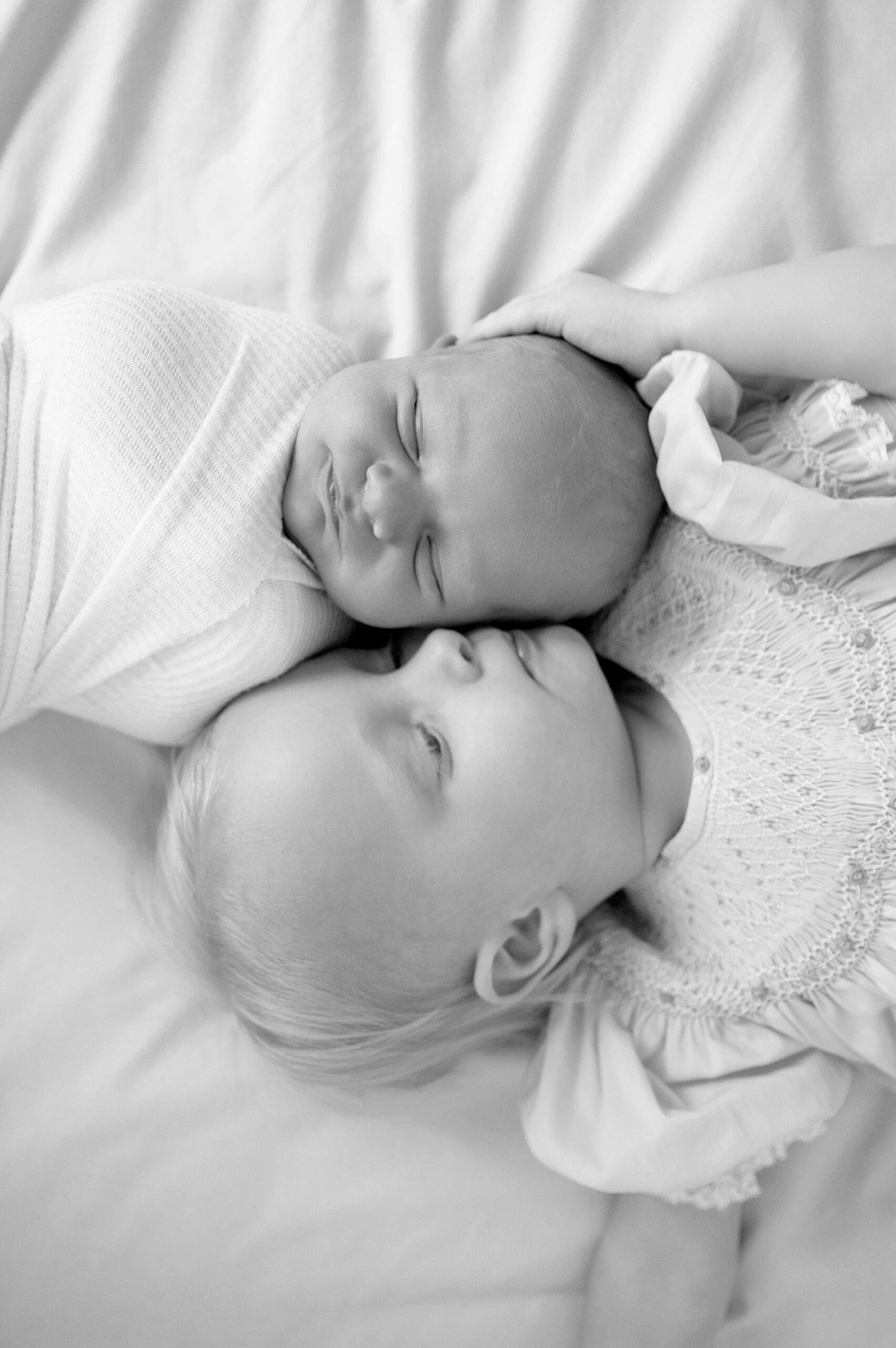sweet sibling portraits during studio newborn session 