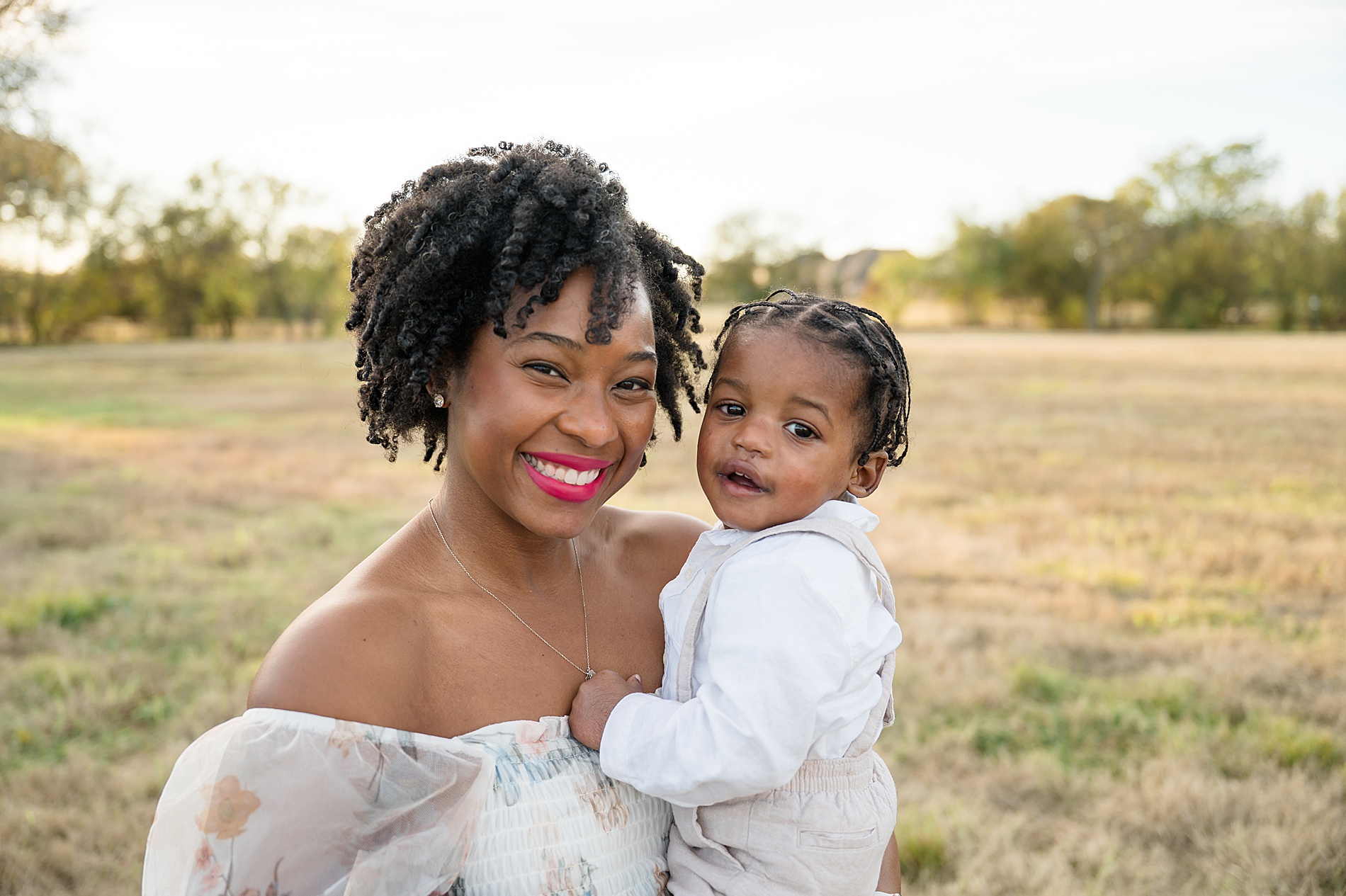 mom holds baby during Fall Family portraits